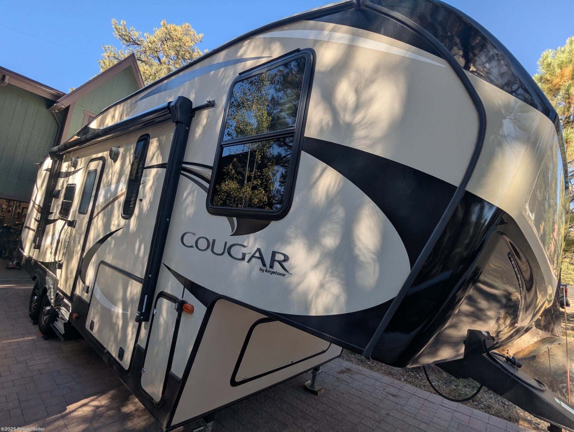 Email now about this 2019 Keystone Cougar 25reswe rear living! Used 2019 Keystone Cougar 25reswe rear living available in Munds Park, Arizona