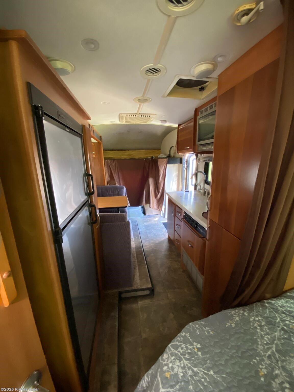 Refrigerator, Wardrobe and Bed from Back