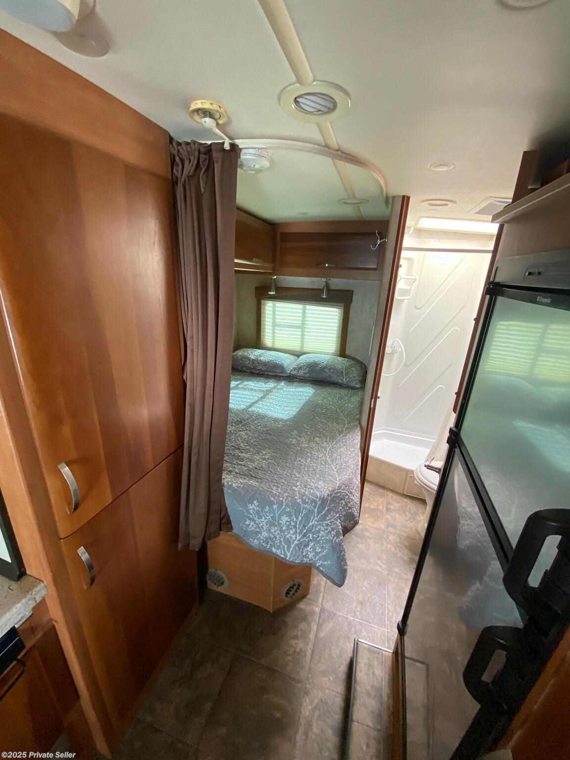 Wardrobe, Bed, Bathroom and Refrigerator from Front