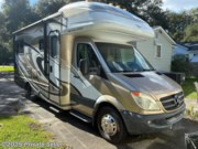 Call now about this 2011 Fleetwood Jamboree 24D! Passenger Side