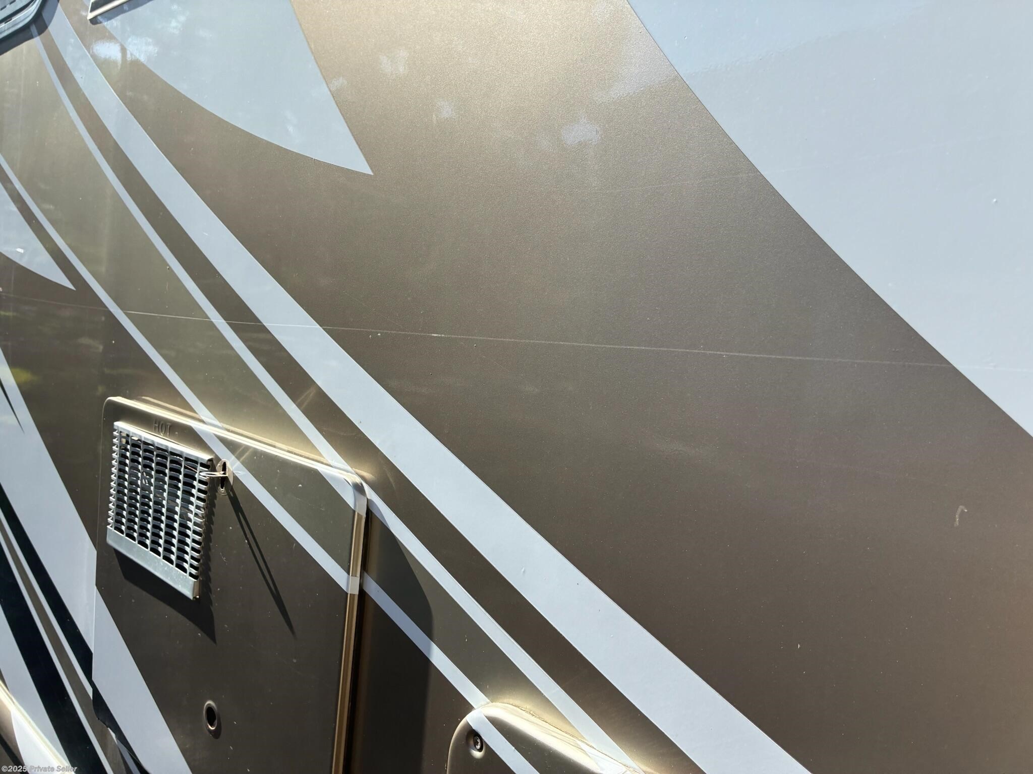 Mid Passenger Side Scratch near Water Heater 2