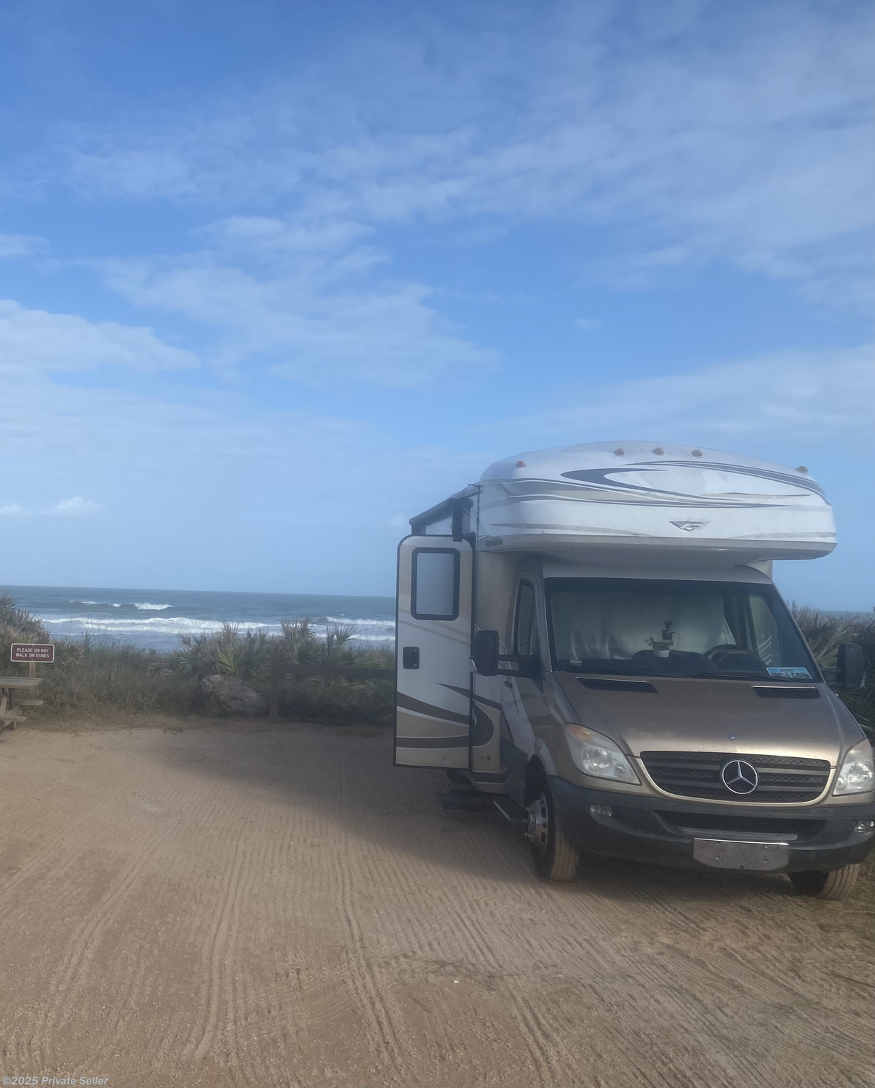 Contact us now about this 2011 Fleetwood Jamboree 24D! Front at a Beach Campsite