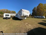 Contact us now about this 2012 Keystone Laredo 310RE! 2012 Laredo 310RE by Keystone from Blue Compass RV South Raleigh in Benson, North Carolina