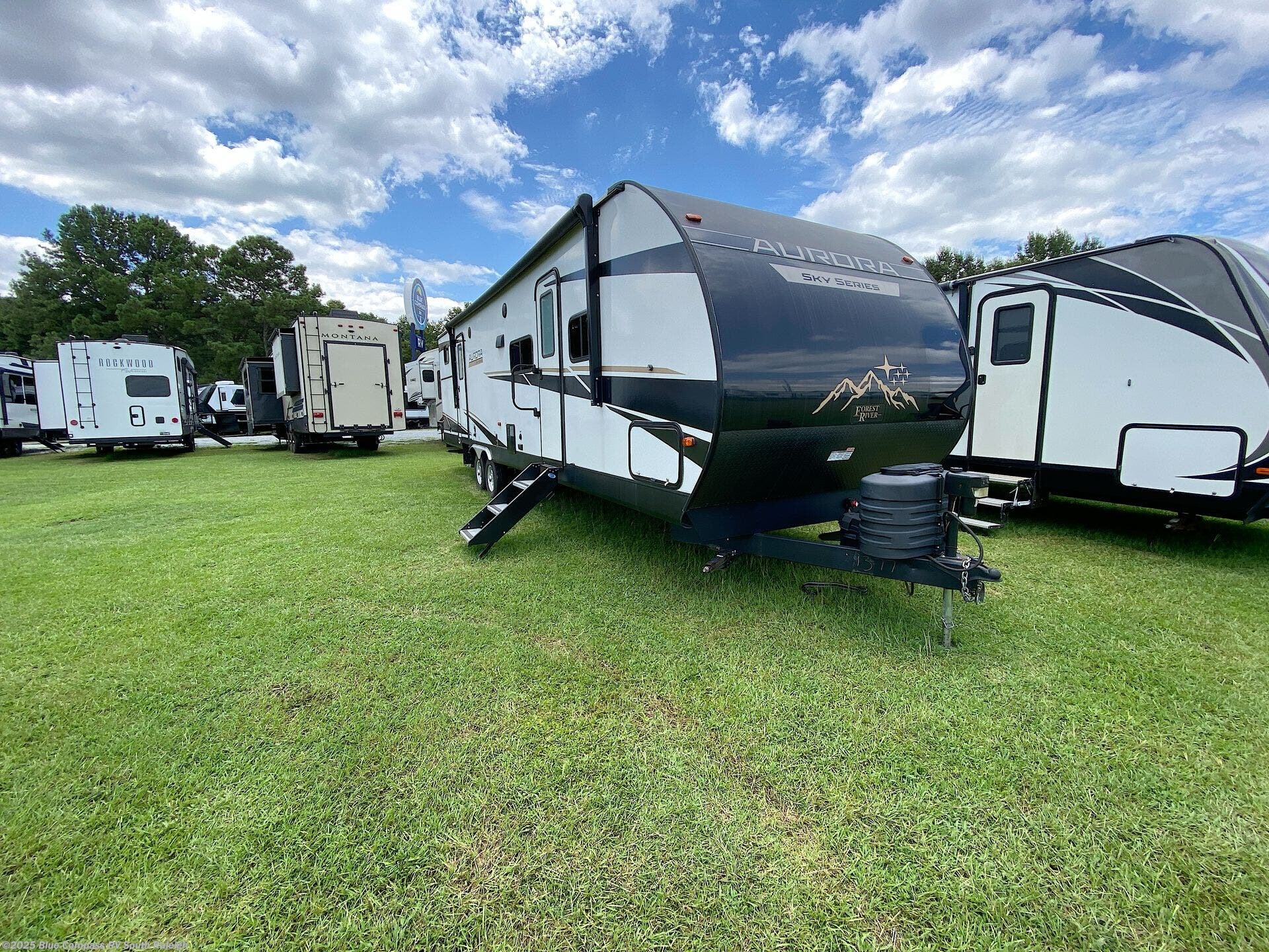 Contact us now about this 2023 Forest River Aurora Sky Series 320bds Series! 2023 Aurora Sky Series 320bds Series by Forest River from Blue Compass RV South Raleigh in Benson, North Carolina