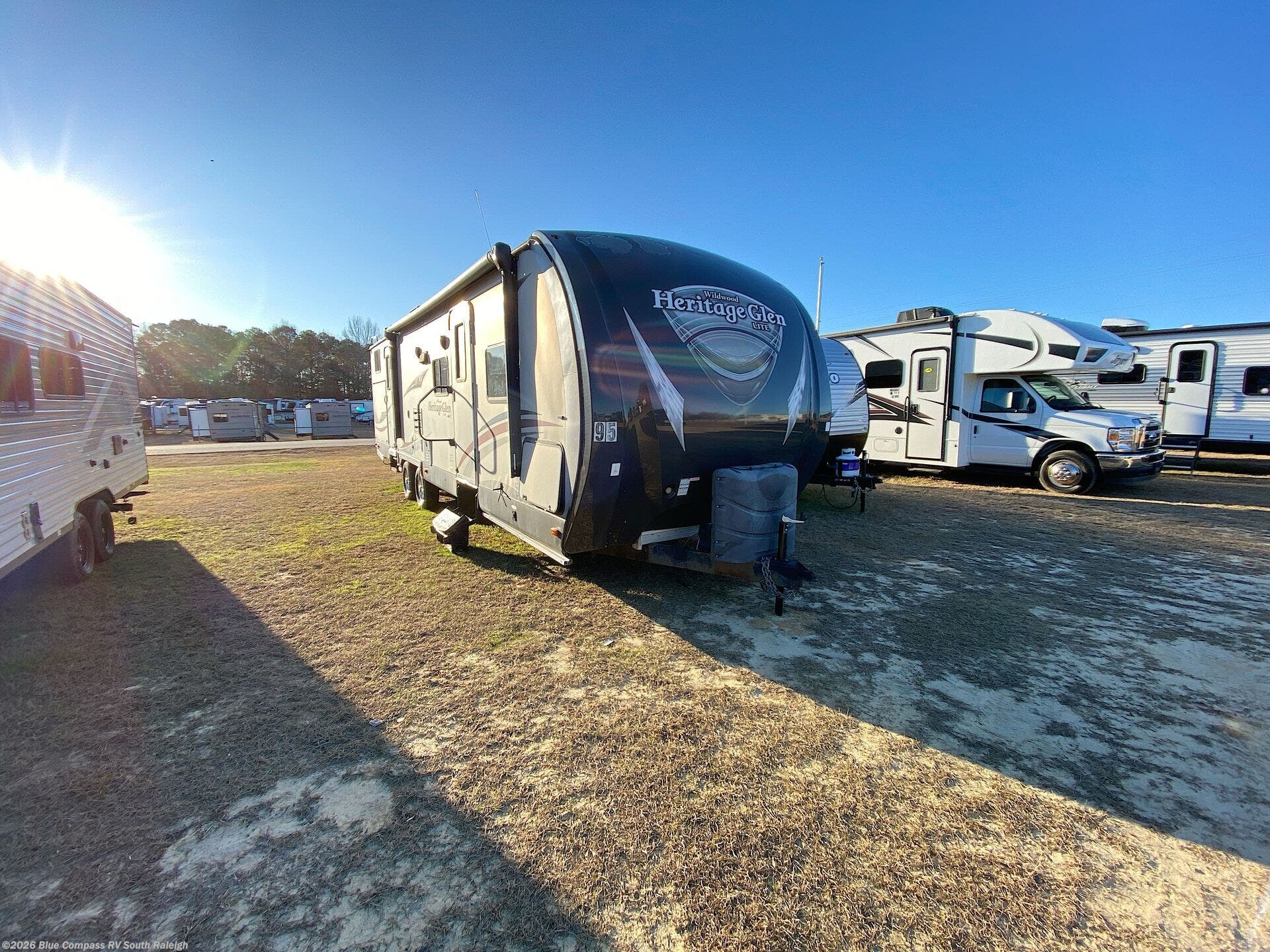 Contact us now about this 2014 Forest River Wildwood Heritage Glen 312QBUD! 2014 Wildwood Heritage Glen 312QBUD by Forest River from Blue Compass RV South Raleigh in Benson, North Carolina