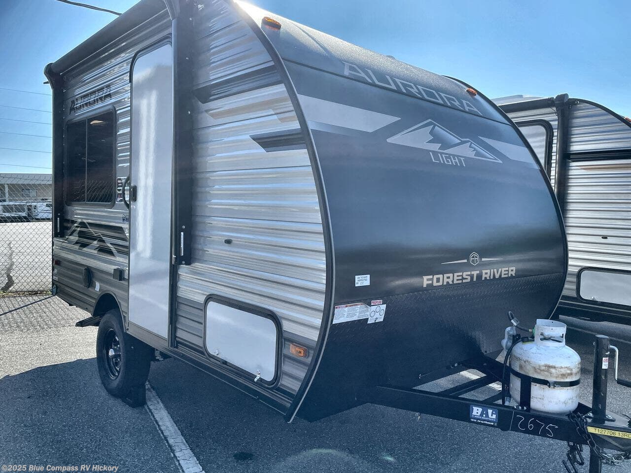 Contact us now about this 2026 Forest River Aurora Light 13RDX! 2026 Aurora Light 13RDX by Forest River from Blue Compass RV Hickory in Claremont, North Carolina