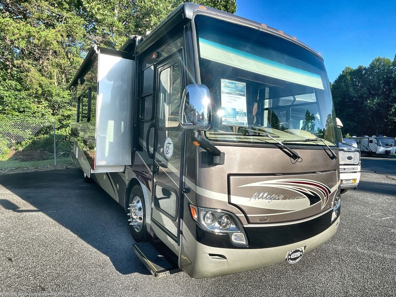 Contact us now about this 2013 Tiffin Allegro Breeze 32BR! 2013 Allegro Breeze 32BR by Tiffin from Blue Compass RV Hickory in Claremont, North Carolina
