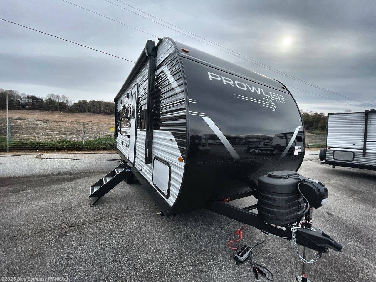 Contact us now about this 2026 Heartland Prowler 2103MKS! 2026 Prowler 2103MKS by Heartland from Blue Compass RV Hickory in Claremont, North Carolina