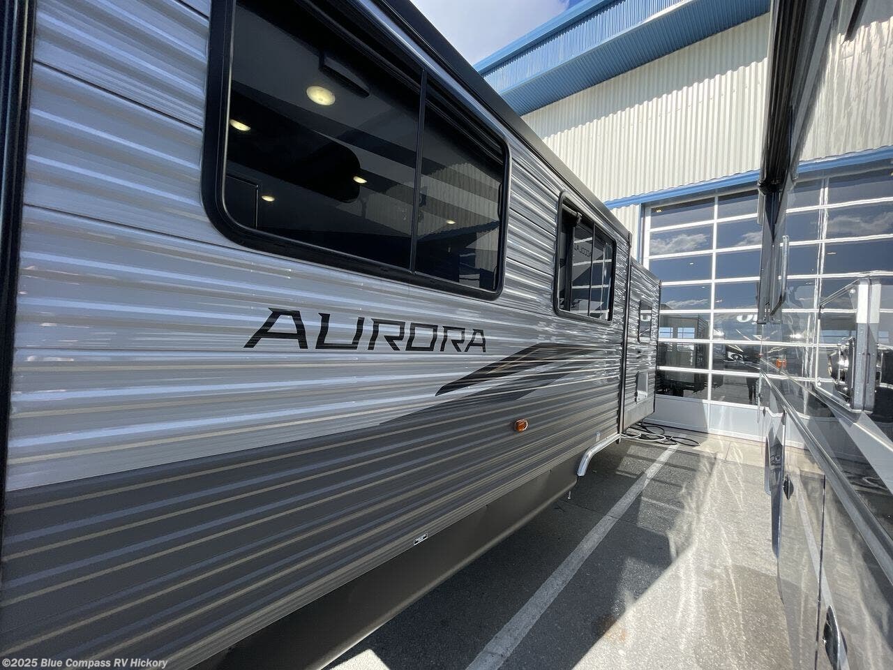 Contact us now about this 2026 Forest River Aurora 26FKDS! 2026 Aurora 26FKDS by Forest River from Blue Compass RV Hickory in Claremont, North Carolina