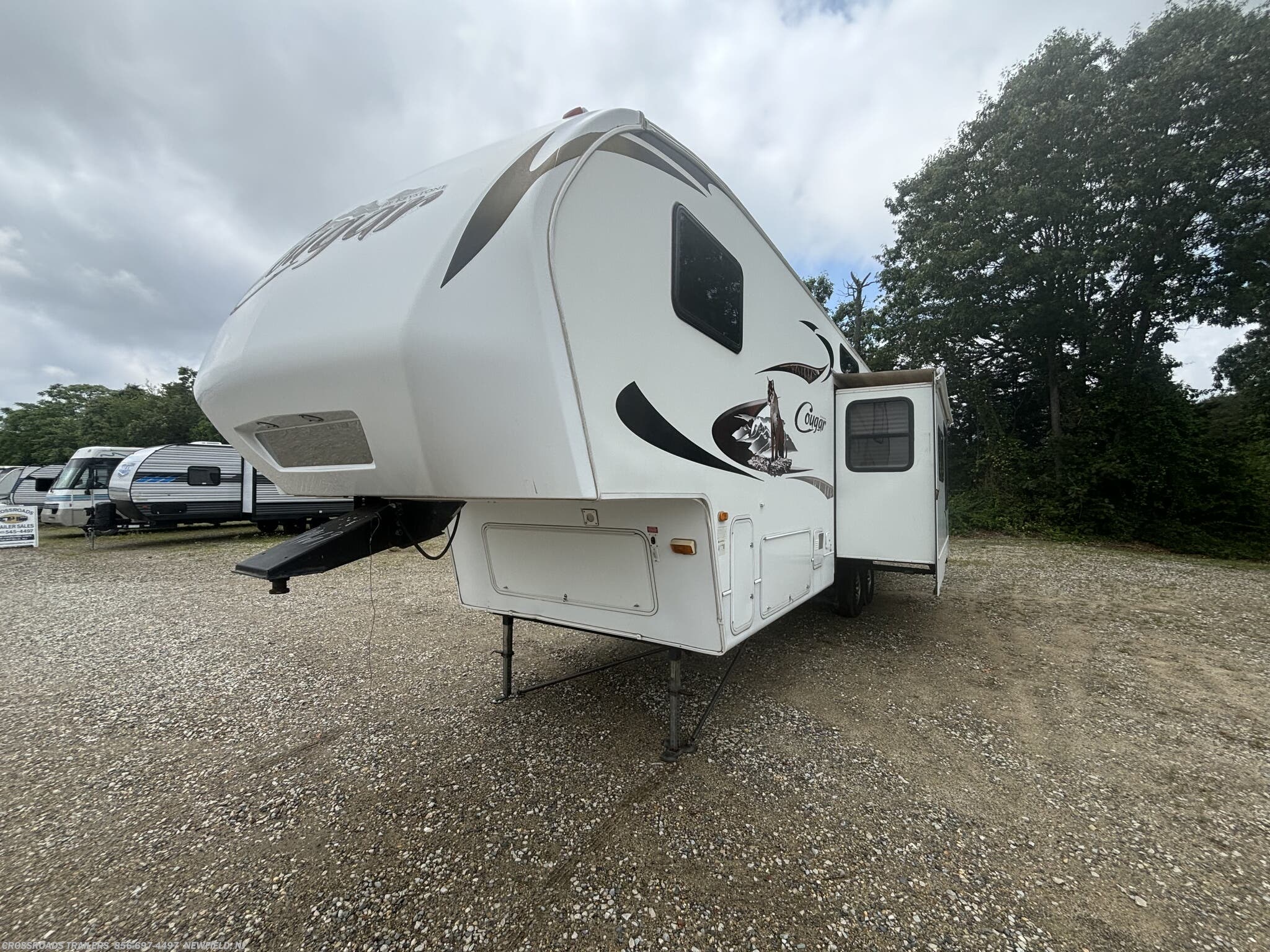 Contact us now about this 2011 Keystone Cougar 325SRX! 2011 Cougar 325SRX by Keystone from Crossroads Trailer Sales, Inc. in Newfield, New Jersey