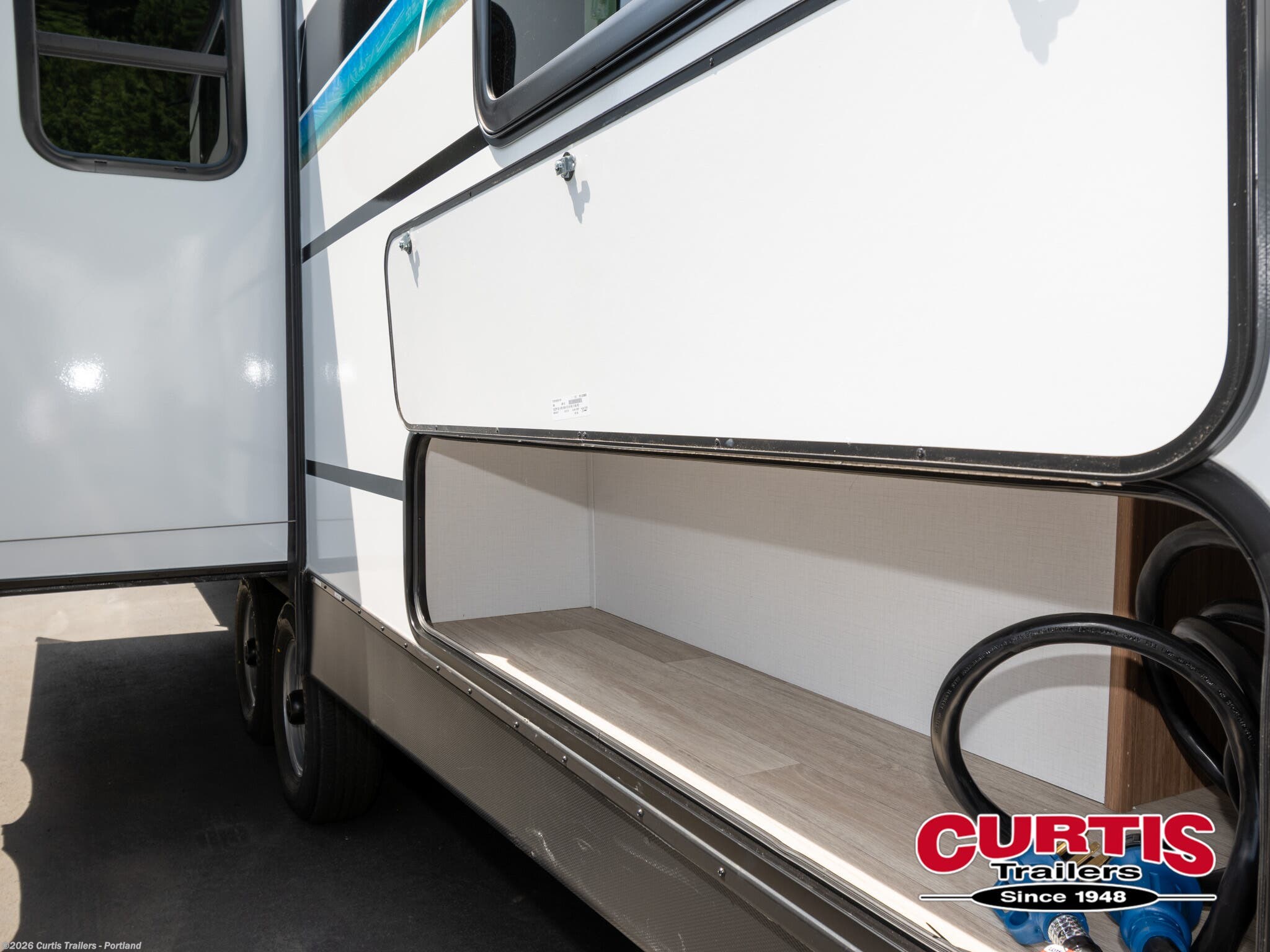 2025 Passport 284QBWE by Keystone from Curtis Trailers - Portland in Portland, Oregon