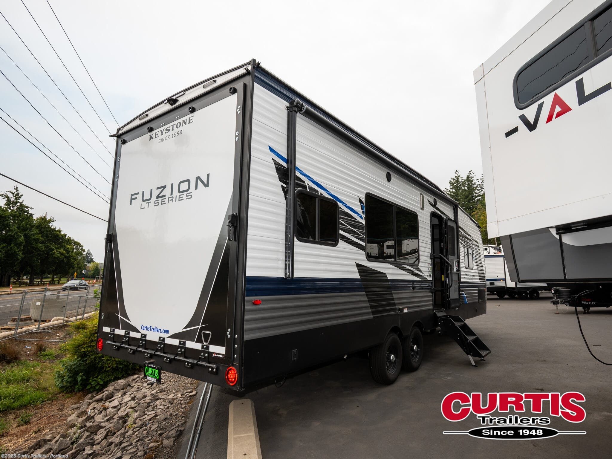 2026 Keystone Fuzion Impact 2813 - New Toy Hauler For Sale by Curtis Trailers - Portland in Portland, Oregon