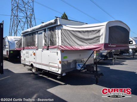 Two King Tent End Beds, Solid Walled Bathroom w/Shower &amp; Flushable Commode, Slideout Portable Dinette Table, Bench Seating w/Storage Below, Double Kitchen Sink, 3 Burner Range, Storage, Outdoor RVQ Grill and More.
