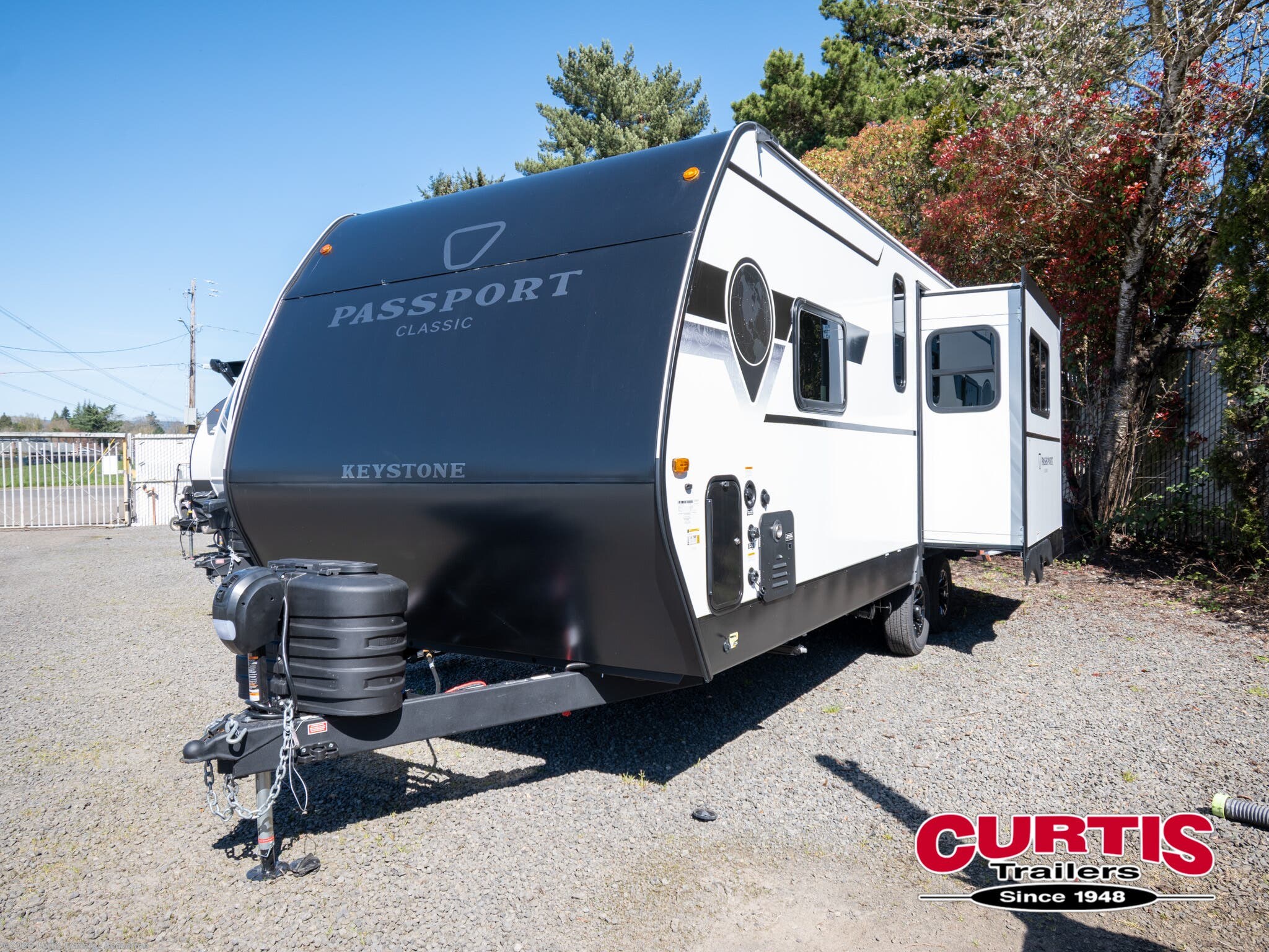 2026 Passport 210RKCWE by Keystone from Curtis Trailers - Beaverton in Beaverton, Oregon