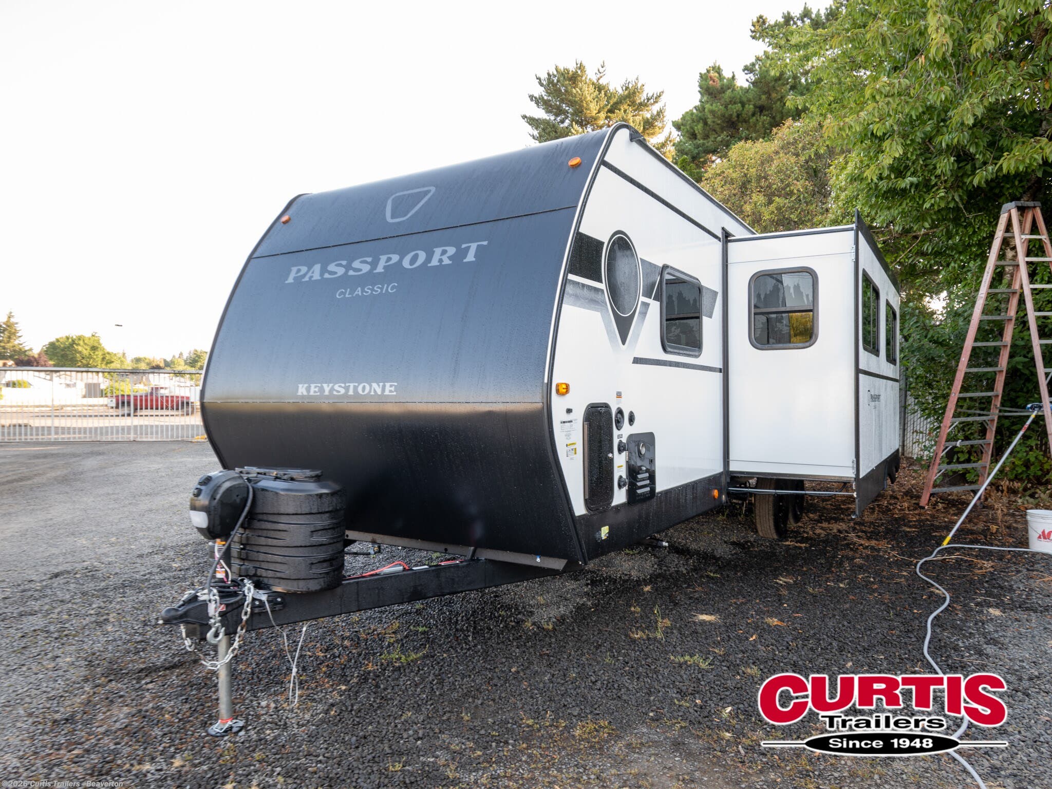 2026 Passport 284QBCWE by Keystone from Curtis Trailers - Beaverton in Beaverton, Oregon