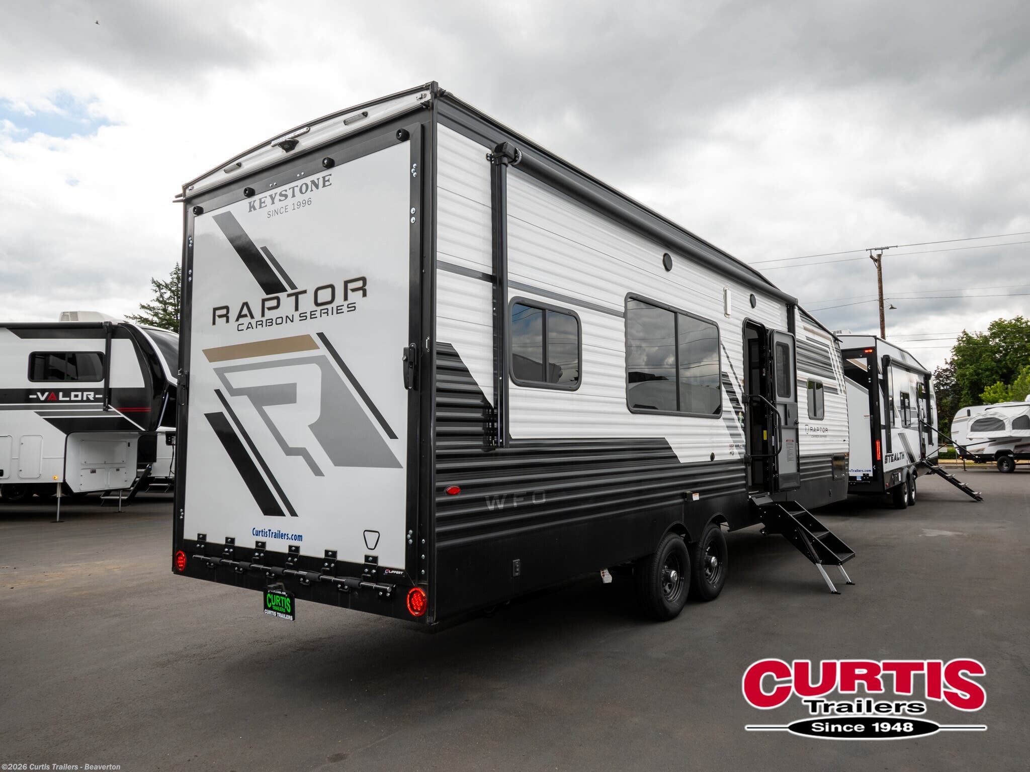 2026 Keystone Raptor Carbon 29WFO - New Toy Hauler For Sale by Curtis Trailers - Beaverton in Beaverton, Oregon