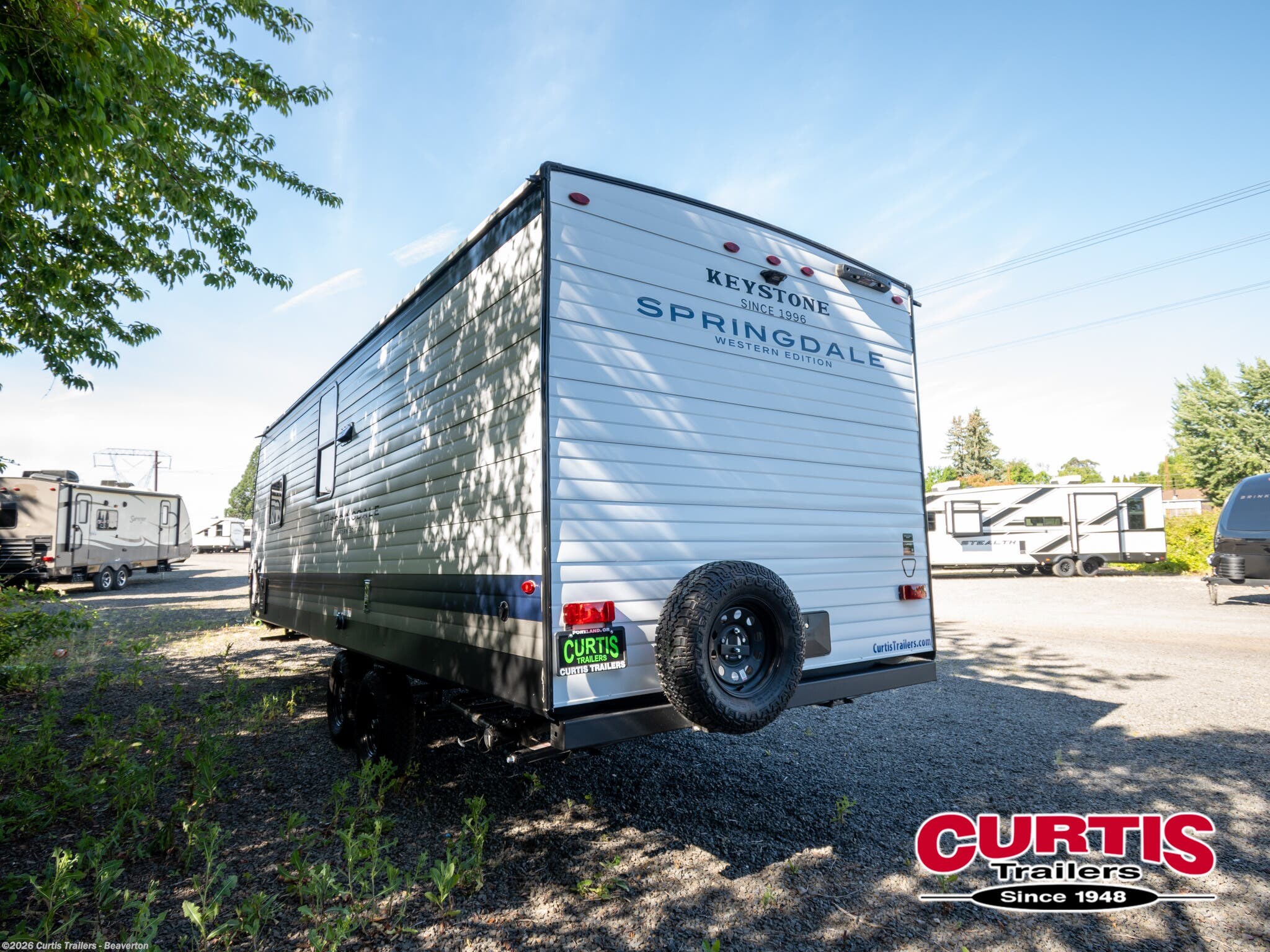 2027 Springdale WEST 2300BHWE by Keystone from Curtis Trailers - Beaverton in Beaverton, Oregon