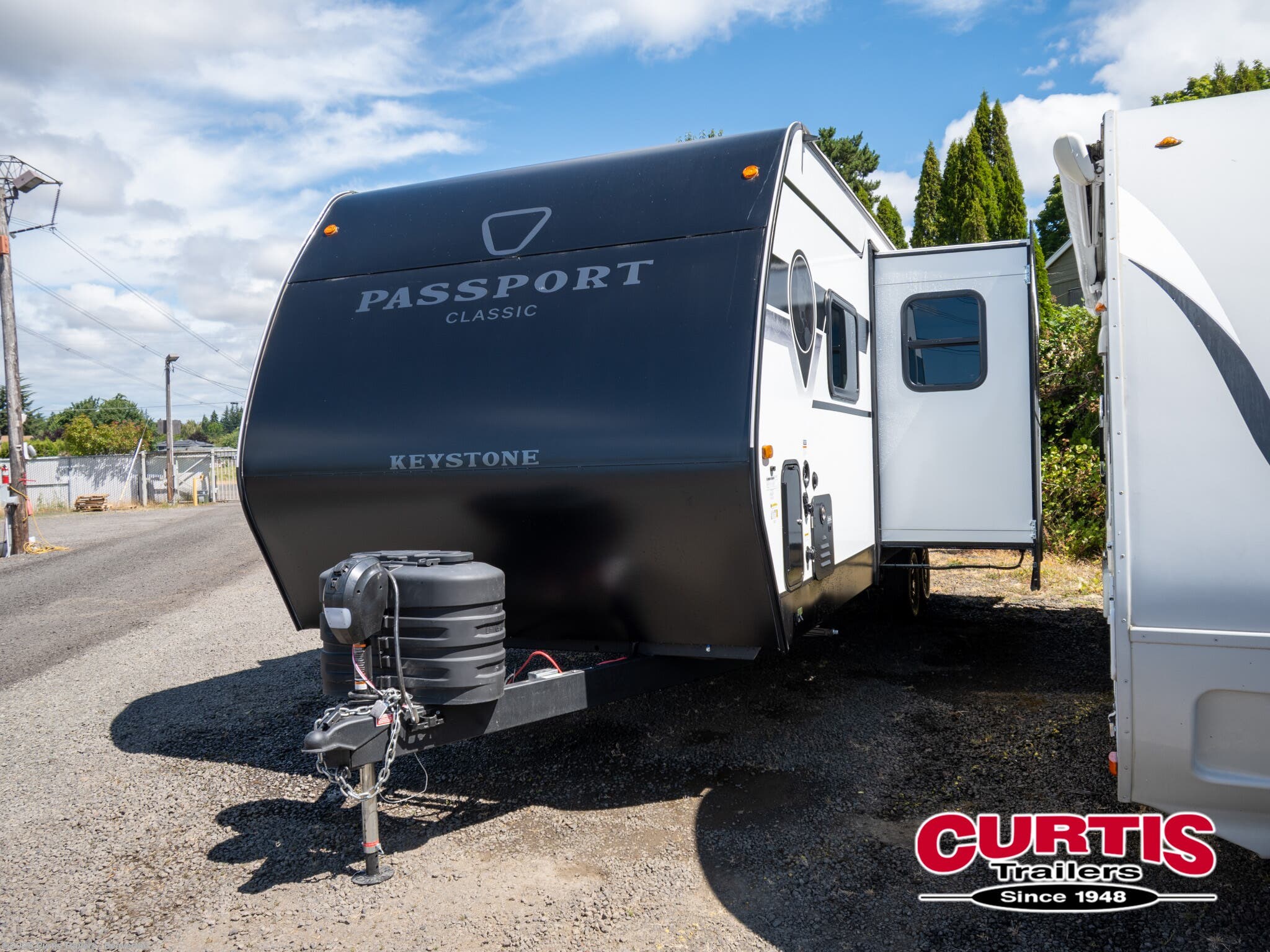 2026 Passport 260BHCWE by Keystone from Curtis Trailers - Beaverton in Beaverton, Oregon