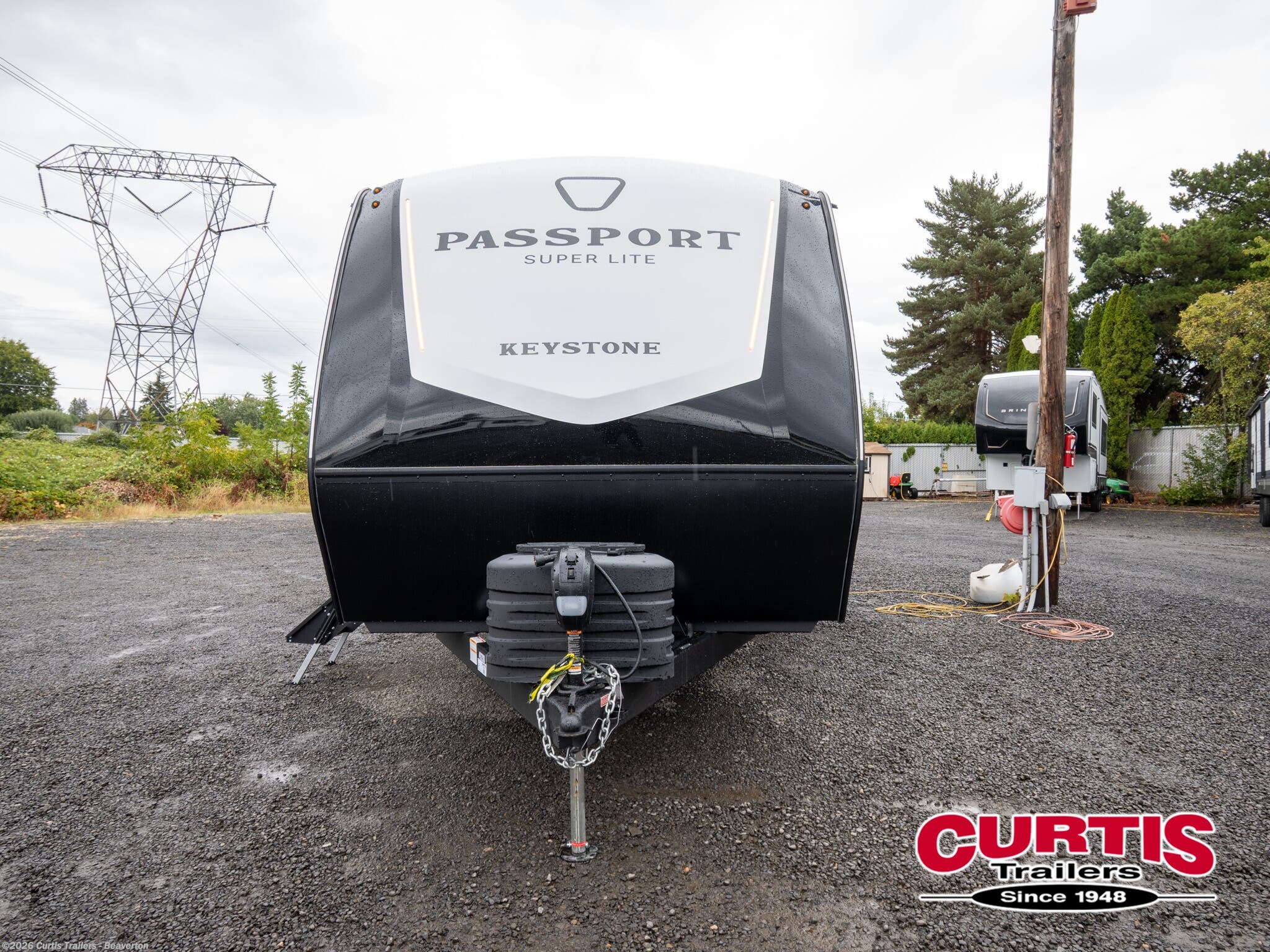 2027 Passport 2450RKWE by Keystone from Curtis Trailers - Beaverton in Beaverton, Oregon