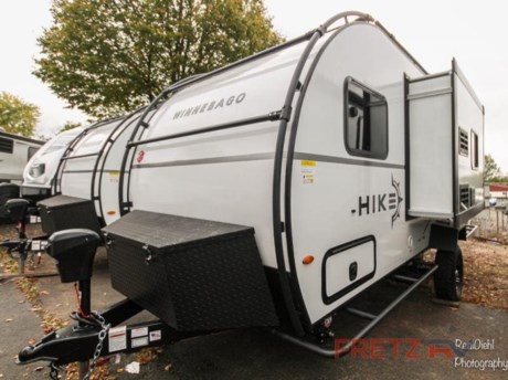 &lt;h2&gt;New 2022 Winnebago Hike 171DB Travel Trailer RV Camper for Sale&lt;/h2&gt; &lt;p&gt;&#160;&lt;/p&gt; &lt;p&gt;This unit includes Versatility Package, Zion Package &amp; Urban Package.&lt;/p&gt; &lt;p&gt;&#160;&lt;/p&gt; &lt;p&gt;&#160;&lt;strong&gt;Winnebago Industries Towables Hike H171DB travel trailer highlights:&lt;/strong&gt;&lt;/p&gt; &lt;ul&gt; &lt;li&gt;RV Queen Bed&lt;/li&gt; &lt;li&gt;U-Shaped Dinette&lt;/li&gt; &lt;li&gt;Off-Road Tires&lt;/li&gt; &lt;li&gt;Exterior Speakers&lt;/li&gt; &lt;li&gt;Powder Coated Rack System&lt;/li&gt; &lt;/ul&gt; &lt;p&gt;&#160;&lt;/p&gt; &lt;p&gt;Pack your bags and load up this travel trailer! The&#160;&lt;strong&gt;rear U-shaped dinette&lt;/strong&gt;&#160;doubles as a dining area and as a sleeping space once converted. There is not only plenty of storage inside with the shelving, the kitchen pantry, and the wardrobe, but also outside with the powder coated&#160;&lt;strong&gt;multi-use storage&lt;/strong&gt;&#160;area. The kitchen is fully equipped with the appliances needed to create home cooked meals, plus a&#160;&lt;strong&gt;convection microwave&lt;/strong&gt;&#160;to pop a bag of popcorn while you watch your favorite movie on the LED TV. There is a RV queen bed and next to the bed is the&#160;&lt;strong&gt;full bathroom&lt;/strong&gt;&#160;for you to take a quick shower before heading to bed!&lt;/p&gt; &lt;p&gt;&#160;&lt;/p&gt; &lt;p&gt;Each one of these Winnebago Industries Towables Hike travel trailers will take you off the beaten path with&#160;&lt;strong&gt;off-road tires&lt;/strong&gt;, offset wheels, and robust fenders! The front&#160;&lt;strong&gt;multi-use gear storage&lt;/strong&gt;&#160;lets you pack in more adventure with space for a battery, LP tanks or adventure gear. Their&#160;&lt;strong&gt;rugged exoskeleton&lt;/strong&gt;&#160;lets you securely attach a bike or kayak with an exterior powder coated rack system. The exterior fiberglass sidewalls come with an&#160;&lt;strong&gt;Azdel substrate&lt;/strong&gt;&#160;for an easier tow, and the NXG engineered frame will hold up through all of your adventures. Crank up the tunes with the exterior speakers and relax underneath the power awning with LED lighting!&lt;/p&gt; &lt;p&gt;&#160;&lt;/p&gt; &lt;p&gt;We are a top dealer for all 2020, 2021, 2022, and 2023&#160;Winnebago Minnie, Micro, Voyage, Hike, Jayco Jay Flight, Eagle, HT, Jay Feather, White Hawk, North Point, Pinnacle, Talon, Octane, Seismic, SLX, Opus, OP4, OP2, OP15, OPLite, Air Off Road, and TAXA Outdoors, Habitat, Cricket, Tiger Moth, Mantis trailers, and fifth 5&lt;sup&gt;th&lt;/sup&gt;&#160;wheels in the Philadelphia, Delaware, New Jersey, and New York Areas. These campers come in as Travel Trailers, Fifth 5th Wheels, Toy Haulers, Pop Ups, Hybrids, Tear Drops, and Folding Campers. These Brands are at the top of their class.&lt;/p&gt; &lt;p&gt;&#160;&lt;/p&gt; &lt;p&gt;Camper floorplans come with anywhere between zero to 5 slides. Most can be pulled with a &#189; ton truck, SUV or Minivan. If you are not sure if you can tow certain weights, you can contact us or you can get tow ratings from Trailer Life towing guide.&lt;/p&gt; &lt;p&gt;&#160;&lt;/p&gt; &lt;p&gt;We also carry used and Certified Pre-owned brands like Forest River, Mobile Suites, DRV, T@B, T@G, Dutchmen, Keystone, KZ, Grand Design, Reflection, Imagine, Passport, Lance Freedom Lite, Freedom Express, Flagstaff, Rockwood, Casita, Scamp, Cedar Creek, Montana, Passport, Little Guy, Coachmen, Catalina, Cougar, Springdale, Sunset Trail, Raptor, Gulf Stream and Airstream, and are always below NADA values. We take all types of trades. When it comes to campers, we are your full-service stop. With over 75 years in business, we have built an excellent reputation in the Recreational Vehicle and Camping industry to our customers as well as our suppliers and manufacturers. At Fretz RV we have a 12,000 Sq. Ft showroom, a huge RV&#160;Parts and Accessories store. We have added a 30,000 square foot Indoor Service Facility that opened in the Spring of 2018. We have full Service and Repair shop with RVIA Certified Technicians. Bank financing is available for RV loans with a wide variety of lenders ready to earn your business. It doesn&#39;t matter what state you are from; we have lenders available in those areas. We have RV Insurance through Geico and Progressive that we can provide instant quotes, RV Warranties through Compass and XtraRide, and RV Rentals. We have detailed videos on RVTrader, RVT, Classified Ads, eBay, RVUSA and Youtube. Like us on Facebook. Check out our great Google and Dealer Rater reviews at Fretz RV. We are located at 3479 Bethlehem Pike,&#160;Souderton,&#160;PA&#160;18964&#160;215-723-3121.&#160;Start Camping now and see the world. We pass money savings direct to you. Call for details.&lt;/p&gt;&lt;ul&gt;&lt;li&gt;U Shaped Dinette&lt;/li&gt;&lt;/ul&gt;