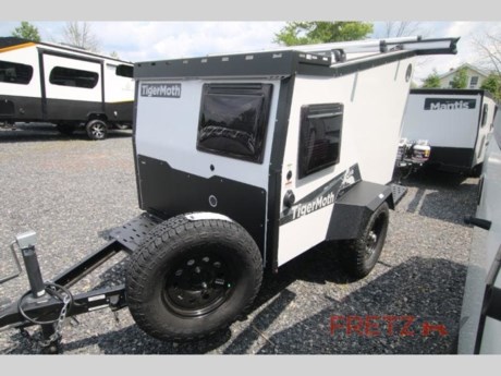 &lt;h2&gt;New 2022 Taxa Outdoors Tiger Moth Travel Trailer Camper for Sale at Fretz RV&lt;/h2&gt; &lt;p&gt;&#160;&lt;/p&gt; &lt;p&gt;This unit includes roof rack, Soft Goods Package &amp; tongue tool box.&lt;/p&gt; &lt;p&gt;&#160;&lt;/p&gt; &lt;p&gt;&lt;strong&gt;TAXA Outdoors Tiger Moth travel trailer Std. Model highlights:&lt;/strong&gt;&lt;/p&gt; &lt;ul&gt; &lt;li&gt;Full-Size Bed&lt;/li&gt; &lt;li&gt;Caf&#233; Table&lt;/li&gt; &lt;li&gt;Pull-Out Kitchen&lt;/li&gt; &lt;li&gt;Fresh Water Tank&lt;/li&gt; &lt;li&gt;All-Terrain Tires&lt;/li&gt; &lt;/ul&gt; &lt;p&gt;&#160;&lt;/p&gt; &lt;p&gt;You will enjoy seeking adventure as much as the destination with this lightweight, easy-to-tow Tiger Moth travel trailer that can fit in most standard garages thanks to its 12&#39; 10&quot; length. There is &lt;strong&gt;sleeping space for two&lt;/strong&gt;&#160;and an &lt;strong&gt;optional rooftop tent&lt;/strong&gt; that can sleep two to three more adults. With the open design, you will have good ventilation and beautiful views wherever you decide to set up camp. The &lt;strong&gt;built-in electrical system&lt;/strong&gt; and and pre-wired solar input allow you to stay off-grid up to seven days if you wish. And, the &lt;strong&gt;large&lt;/strong&gt; &lt;strong&gt;side hatch&lt;/strong&gt; gives you easy access to your gear.&#160;&lt;/p&gt; &lt;p&gt;&#160;&lt;/p&gt; &lt;p&gt;Meet the incredibly &lt;strong&gt;versatile&lt;/strong&gt;, ruggedly built, and adventurous Tiger Moth travel trailer from TAXA Outdoors! Built on a powder-coated steel chassis with &lt;strong&gt;laser-cut aluminum skeleton&lt;/strong&gt; and Kynar-painted aluminum composite panels, the Tiger Moth offers sleeping space for two. Other features include&#160;&lt;strong&gt;birch plywood cabinetry&lt;/strong&gt;, LED interior lighting with &lt;strong&gt;reading lights&lt;/strong&gt;, and much more for an outdoor adventure with several comforts of home! Hitch up today and start having fun!&#160;&lt;/p&gt; &lt;p&gt;&#160;&lt;/p&gt; &lt;p&gt;We are a premier dealer for all 2022, 2023, 2024 and 2025&#160;Winnebago Minnie, Micro, M-Series, Access, Voyage, Hike, 100, FLX, Flex, Jayco Jay Flight, Eagle, HT, Jay Feather, Micro, White Hawk, Bungalow, North Point, Pinnacle, Talon, Octane, Seismic, SLX, OPUS, OP4, OP2, OP15, OPLite, Air Off Road, and TAXA Outdoors, Habitat, Overland, Cricket, Tiger Moth, Mantis, Ember RV Touring and Skinny Guy Truck Campers.&#160;So, if you are in the York, Harrisburg, Lancaster, Philadelphia, Allentown, New Jersey, Delaware New York, or Maryland regions; stop by and browse our huge RV inventory today.&#160;Fretz RV has been a Jayco Dealer Partner for over 40 years, Winnebago Dealer Partner for over 30 Years.&lt;/p&gt; &lt;p&gt;&#160;&lt;/p&gt; &lt;p&gt;These campers come in as Travel Trailers, Fifth 5th Wheels, Toy Haulers, Pop Ups, Hybrids, Tear Drops, and Folding Campers. These Brands are at the top of their class. Camper floorplans come with anywhere between zero to 5 slides. Most can be pulled with a &#189; ton truck, SUV or Minivan. If you are not sure if you can tow certain weights, you can contact us or you can get tow ratings from Trailer Life towing guide.&lt;/p&gt; &lt;p&gt;We also carry used and Certified Pre-owned brands like Forest River, Salem, Wildwood, &#160;TAB, TAG, NuCamp, Cherokee, Coleman, R-Pod, A-Liner, Dutchmen, Keystone, KZ, Grand Design, Reflection, Imagine, Passport, Lance, Solitude, Freedom Lite, Express, Flagstaff, Rockwood, Montana, Passport, Little Guy, Coachmen, Catalina, Cougar, &#160;Sunset Trail, Raptor, Vengeance, Gulf Stream and Airstream, and are always below NADA values. We take all types of trades. When it comes to campers, we are your full-service stop. With over 77 years in business, we have built an excellent reputation in the Recreational Vehicle and Camping industry to our customers as well as our suppliers and manufacturers.&#160;With our participation in the Hershey RV Show every year we can display the newest product with great savings to customers! Besides our online presence, at Fretz RV we have a 12,000 Sq. Ft showroom, a huge RV&#160;Parts, and Accessories store. We have added a 30,000 square foot Indoor Service Facility that opened in the Spring of 2018. We have a full Service and Repair shop with RVIA Certified Technicians. &#160;Financing available. We have RV Insurance through Geico Brown and Brown and Progressive that we can provide instant quotes, RV Warranties through Compass and Protective XtraRide, and RV Rentals. We have detailed videos on RVTrader, RVT, Classified Ads, eBay, RVUSA and Youtube. Like us on Facebook. Check out our great Google and Dealer Rater reviews at Fretz RV. We are located at 3479 Bethlehem Pike,&#160;Souderton,&#160;PA&#160;18964&#160;215-723-3121&#160;&lt;/p&gt; &lt;p&gt;#RV #GoCamping #GoRVing #1 #Used #New #PaDealer #Camping&lt;/p&gt;&lt;ul&gt;&lt;li&gt;Outdoor Kitchen&lt;/li&gt;&lt;/ul&gt;&lt;ul&gt;&lt;li&gt;Roof RackSoft Good Package 1(Awning, Screen Door, Shower Tent)Tongue Tool Box&lt;/li&gt;&lt;/ul&gt;