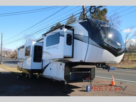 &lt;h2&gt;&lt;strong&gt;New 2023 Jayco North Point 382FLRB Luxury Fifth 5th Wheel Camper for Sale at Fretz RV&lt;/strong&gt;&lt;/h2&gt; &lt;p&gt;&#160;&lt;/p&gt; &lt;p&gt;This unit includes Jayco&#39;s Customer Value Package w/15,000 BTU A/C &amp; heat pump, North Point Luxury Package, Overlander II Solar Package,&#160; Extreme Weather Package, 39&quot; tailgate TV in cargo area, generator LP prep &amp; slideout awnings.&lt;/p&gt; &lt;p&gt;&#160;&lt;/p&gt; &lt;p&gt;&lt;strong&gt;Jayco North Point fifth wheel 382FLRB highlights:&lt;/strong&gt;&lt;/p&gt; &lt;ul&gt; &lt;li&gt;Separate Living Area&lt;/li&gt; &lt;li&gt;Dual Sink Full Bath&lt;/li&gt; &lt;li&gt;Half Bath&lt;/li&gt; &lt;li&gt;Middle Kitchen&lt;/li&gt; &lt;li&gt;Kitchen Island&lt;/li&gt; &lt;li&gt;Outside Kitchen&lt;/li&gt; &lt;/ul&gt; &lt;p&gt;&#160;&lt;/p&gt; &lt;p&gt;Entertainment can be found throughout this fifth wheel from the front living area with a 50&quot; Smart LED HDTV with &lt;strong&gt;fully digital HDMI output&lt;/strong&gt; and home entertainment system with subwoofer including a fireplace below that you can enjoy while relaxing on theater seats and two tri-fold sofas within slide outs, a 32&quot; TV in the middle kitchen and there is a bedroom 32&quot; TV. You might even like to add the &lt;strong&gt;tailgate TV option&lt;/strong&gt; along the exterior. Back inside the kitchen, the cook will love the center island, the pantry, the 21 cu. residential refrigerator or choose the 18 cu. ft. option, and the free standing table without a pedestal and includes a &lt;strong&gt;leaf&lt;/strong&gt;, two free standing chairs and two folding chairs. The half bath is a few steps away as an added convenience. The master bedroom includes a queen bed slide, a &lt;strong&gt;bench&lt;/strong&gt;, two wardrobes and a sliding door into the bathroom which offers two sinks, a space prepped for a washer/dryer option, and a walk-in shower. And don&#39;t forget about the exterior features such as the outside kitchen for more choices when making meals, the &lt;strong&gt;storage&lt;/strong&gt; for your outdoor gear and chairs, and the two awnings with integrated LED lighting.&lt;/p&gt; &lt;p&gt;&#160;&lt;/p&gt; &lt;p&gt;With any North Point fifth wheel by Jayco you begin with a strong foundation with a &lt;strong&gt;custom frame&lt;/strong&gt;, designed and sized specifically to best support each unit. Constructed with&#160;Stronghold VBL™ aluminum framed, vacuum bond laminated walls and the Magnum Truss™ XL6™ roof system with a one-piece, &lt;strong&gt;seamless DiFlex II material&lt;/strong&gt; which is the strongest tested roof in the industry. The &lt;strong&gt;5-Star Handling package&lt;/strong&gt; is included with Goodyear Endurance tires made in the USA, a MORryde rubber pin box, Dexter axles with Nev-R-Adjust brakes, &lt;strong&gt;MORryde CRE-3000 rubberized suspension&lt;/strong&gt; and wet bolt fasteners and bronze bushings. The interior has handcrafted hardwood glazed doors, drawers and trim, vinyl flooring throughout &lt;strong&gt;made in the USA&lt;/strong&gt; including on slide out floors, a residential bathroom backsplash and vessel bowl sink in the main bathroom, plus so much more you just have to see one to believe it all!&lt;/p&gt; &lt;p&gt;&#160;&lt;/p&gt; &lt;p&gt;We are a premier dealer for all 2022, 2023, 2024 and 2025&#160;Winnebago Minnie, Micro, M-Series, Access, Voyage, Hike, 100, FLX, Flex, Jayco Jay Flight, Eagle, HT, Jay Feather, Micro, White Hawk, Bungalow, North Point, Pinnacle, Talon, Octane, Seismic, SLX, OPUS, OP4, OP2, OP15, OPLite, Air Off Road, and TAXA Outdoors, Habitat, Overland, Cricket, Tiger Moth, Mantis, Ember RV Touring and Skinny Guy Truck Campers.&#160;So, if you are in the York, Harrisburg, Lancaster, Philadelphia, Allentown, New Jersey, Delaware New York, or Maryland regions; stop by and browse our huge RV inventory today.&#160;Fretz RV has been a Jayco Dealer Partner for over 40 years, Winnebago Dealer Partner for over 30 Years.&lt;/p&gt; &lt;p&gt;&#160;&lt;/p&gt; &lt;p&gt;These campers come in as Travel Trailers, Fifth 5th Wheels, Toy Haulers, Pop Ups, Hybrids, Tear Drops, and Folding Campers. These Brands are at the top of their class. Camper floorplans come with anywhere between zero to 5 slides. Most can be pulled with a &#189; ton truck, SUV or Minivan. If you are not sure if you can tow certain weights, you can contact us or you can get tow ratings from Trailer Life towing guide.&lt;/p&gt; &lt;p&gt;We also carry used and Certified Pre-owned brands like Forest River, Salem, Wildwood, &#160;TAB, TAG, NuCamp, Cherokee, Coleman, R-Pod, A-Liner, Dutchmen, Keystone, KZ, Grand Design, Reflection, Imagine, Passport, Lance, Solitude, Freedom Lite, Express, Flagstaff, Rockwood, Montana, Passport, Little Guy, Coachmen, Catalina, Cougar, &#160;Sunset Trail, Raptor, Vengeance, Gulf Stream and Airstream, and are always below NADA values. We take all types of trades. When it comes to campers, we are your full-service stop. With over 77 years in business, we have built an excellent reputation in the Recreational Vehicle and Camping industry to our customers as well as our suppliers and manufacturers.&#160;With our participation in the Hershey RV Show every year we can display the newest product with great savings to customers! Besides our online presence, at Fretz RV we have a 12,000 Sq. Ft showroom, a huge RV&#160;Parts, and Accessories store. We have added a 30,000 square foot Indoor Service Facility that opened in the Spring of 2018. We have a full Service and Repair shop with RVIA Certified Technicians. &#160;Financing available. We have RV Insurance through Geico Brown and Brown and Progressive that we can provide instant quotes, RV Warranties through Compass and Protective XtraRide, and RV Rentals. We have detailed videos on RVTrader, RVT, Classified Ads, eBay, RVUSA and Youtube. Like us on Facebook. Check out our great Google and Dealer Rater reviews at Fretz RV. We are located at 3479 Bethlehem Pike,&#160;Souderton,&#160;PA&#160;18964&#160;215-723-3121&#160;&lt;/p&gt; &lt;p&gt;#RV #GoCamping #GoRVing #1 #Used #New #PaDealer #Camping&lt;/p&gt;&lt;ul&gt;&lt;li&gt;Front Living&lt;/li&gt;&lt;li&gt;Rear Bath&lt;/li&gt;&lt;li&gt;Outdoor Kitchen&lt;/li&gt;&lt;li&gt;Kitchen Island&lt;/li&gt;&lt;li&gt;Bath and a Half&lt;/li&gt;&lt;/ul&gt;&lt;ul&gt;&lt;li&gt;Customer Value Package 15K BTUNorth Point Luxury PackageOverlander II Solar PackageExtreme Weather PackageTailgate TV: 39&quot; TV in Cargo AreaGenerator LP PrepSlideout Awnings&lt;/li&gt;&lt;/ul&gt;