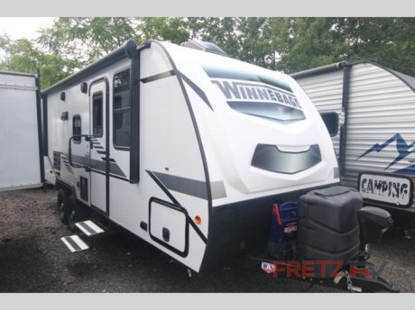 &lt;h2&gt;&lt;strong&gt;Used Pre-Owned 2021 Winnebago Micro Minnie 2306BHS Travel Trailer Camper for Sale at Fretz RV&lt;/strong&gt;&lt;/h2&gt; &lt;p&gt;&#160;&lt;/p&gt; &lt;p&gt;&lt;strong&gt;Winnebago Industries Towables Micro Minnie travel trailer 2306BHS highlights:&lt;/strong&gt;&lt;/p&gt; &lt;ul&gt; &lt;li&gt;Bunk Beds&lt;/li&gt; &lt;li&gt;Murphy Bed&lt;/li&gt; &lt;li&gt;Rear Corner Bath&lt;/li&gt; &lt;li&gt;Booth Dinette Slide&lt;/li&gt; &lt;li&gt;Flip-Up Counter&lt;/li&gt; &lt;/ul&gt; &lt;p&gt;&#160;&lt;/p&gt; &lt;p&gt;Load your kids into this travel trailer and experience a fun family getaway! The &lt;strong&gt;front Murphy bed&lt;/strong&gt; offers versatile living by transforming into a 54&quot; x 74&quot; bed to sleep on at night and a sofa to sit on while socializing with the chef cooking at the &lt;strong&gt;three burner cooktop&lt;/strong&gt;. The 44&quot; x 72&quot; booth dinette slide is a great place to eat your meals at, play games as a family, and even transform into an extra sleeping space if your kids want a friend to tag along. The kids will love sleeping on the rear corner 28&quot; x 72&quot; &lt;strong&gt;bunk beds&lt;/strong&gt; and having the rear corner bathroom right next to them. As if that wasn&#39;t enough, there is an &lt;strong&gt;exterior pack-n-play door&lt;/strong&gt;, a power awning with LED lighting, and patio speakers to crank up the tunes!&lt;/p&gt; &lt;p&gt;&#160;&lt;/p&gt; &lt;p&gt;Start out on your boundless journey in one of these Winnebago Industries Towables Micro Minnie travel trailers! Towing is made simple with the &lt;strong&gt;7&#39; width&lt;/strong&gt; to keep your Micro Minnie in your rear-view mirror and can turn at a snap. They don&#39;t lack in features although they are compact in size. The &lt;strong&gt;spacious galley&lt;/strong&gt; with the sink, the refrigerator, the cooktop, and even a microwave allow you to cook without compromise. You will not only enjoy entertainment indoors with the LED TV, the AV system, the WiFi prep, and the wireless cell phone charger, but also outdoors with the patio speakers and the power awning with LED lighting. Each model comes with &lt;strong&gt;flexible exterior storage&lt;/strong&gt; to make packing quick and easy. The extreme weather foil wrapping, the NXG engineered chassis, and the &lt;strong&gt;TPO roof&lt;/strong&gt; ensures you will have years of fun with one of these!&lt;/p&gt; &lt;p&gt;&#160;&lt;/p&gt; &lt;p&gt;We are a premier dealer for all 2022, 2023, 2024 and 2025&#160;Winnebago Minnie, Micro, M-Series, Access, Voyage, Hike, 100, FLX, Flex, Jayco Jay Flight, Eagle, HT, Jay Feather, Micro, White Hawk, Bungalow, North Point, Pinnacle, Talon, Octane, Seismic, SLX, OPUS, OP4, OP2, OP15, OPLite, Air Off Road, and TAXA Outdoors, Habitat, Overland, Cricket, Tiger Moth, Mantis, Ember RV Touring and Skinny Guy Truck Campers.&#160;So, if you are in the York, Harrisburg, Lancaster, Philadelphia, Allentown, New Jersey, Delaware New York, or Maryland regions; stop by and browse our huge RV inventory today.&#160;Fretz RV has been a Jayco Dealer Partner for over 40 years, Winnebago Dealer Partner for over 30 Years.&lt;/p&gt; &lt;p&gt;&#160;&lt;/p&gt; &lt;p&gt;These campers come in as Travel Trailers, Fifth 5th Wheels, Toy Haulers, Pop Ups, Hybrids, Tear Drops, and Folding Campers. These Brands are at the top of their class. Camper floorplans come with anywhere between zero to 5 slides. Most can be pulled with a &#189; ton truck, SUV or Minivan. If you are not sure if you can tow certain weights, you can contact us or you can get tow ratings from Trailer Life towing guide.&lt;/p&gt; &lt;p&gt;We also carry used and Certified Pre-owned brands like Forest River, Salem, Mobile Suites, DRV, Sol Dawn Intech, T@B, T@G, Dutchmen, Keystone, KZ, Grand Design, Reflection, Imagine, Passport, Lance Freedom Lite, Freedom Express, Flagstaff, Rockwood, Casita, Scamp, Cedar Creek, Montana, Passport, Little Guy, Coachmen, Catalina, Cougar, Springdale, Sunset Trail, Raptor, Gulf Stream and Airstream, and are always below NADA values. We take all types of trades. When it comes to campers, we are your full-service stop. With over 77 years in business, we have built an excellent reputation in the Recreational Vehicle and Camping industry to our customers as well as our suppliers and manufacturers.&#160;With our participation in the Hershey RV Show every year we can display the newest product with great savings to customers! Besides our online presence, at Fretz RV we have a 12,000 Sq. Ft showroom, a huge RV&#160;Parts, and Accessories store. We have added a 30,000 square foot Indoor Service Facility that opened in the Spring of 2018. We have a full Service and Repair shop with RVIA Certified Technicians. &#160;Financing available. We have RV Insurance through Geico Brown and Brown and Progressive that we can provide instant quotes, RV Warranties through Compass and Protective XtraRide, and RV Rentals. We have detailed videos on RVTrader, RVT, Classified Ads, eBay, RVUSA and Youtube. Like us on Facebook. Check out our great Google and Dealer Rater reviews at Fretz RV. We are located at 3479 Bethlehem Pike,&#160;Souderton,&#160;PA&#160;18964&#160;215-723-3121&#160;&lt;/p&gt; &lt;p&gt;#RV #GoCamping #GoRVing #1 #Used #New #PaDealer #Camping&lt;/p&gt;&lt;ul&gt;&lt;li&gt;Bunkhouse&lt;/li&gt;&lt;li&gt;Murphy Bed&lt;/li&gt;&lt;/ul&gt;&lt;ul&gt;&lt;li&gt;Non-Smoking UnitNo Pet OdorsAS ISReal CleanRefrigeratorTVLadderPower AwningSlideoutBooth DinetteFurnaceMicrowaveA/CFantastic FanBunk BedsStove Top BurnerGas/Electric Water HeaterPower Hitch JackToiletShower&lt;/li&gt;&lt;/ul&gt;