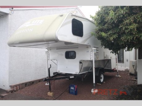 &lt;h2&gt;Used Pre-Owned 2015 Travel Lite Illusion 1100RX Truck Camper w/Generator for Sale at Fretz RV&lt;/h2&gt; &lt;p&gt;&#160;&lt;/p&gt; &lt;p class=&quot;MsoNormal&quot;&gt;Do you like to camp off the grid?&#160; Do you have a 3500 pick-up with an 8’ foot bed?&#160; (The dry weight for this camper is 2830 lbs. )&#160; If your answers are yes and yes, I have a camper for you.&#160; It has a convection microwave, refrigerator, a/c, two fantastic fans, stove top burner, gas/elec water heater, awning, shower, toilet, tv, front queen bed, solar panel, elec jacks, ext shower and tons of fun just around the corner.&#160; It’s priced below book for a quick sale.&#160; So stop and see us. Today!&#160;&lt;/p&gt; &lt;p&gt;&#160;&lt;/p&gt; &lt;p&gt;The 1100RX Illusion hard sided truck camper by Travel Lite is designed to fit most 3/4-ton heavy-duty trucks with 8&#39; beds. &lt;br&gt;&lt;br&gt;Step inside and see just how convenient all of your camping trips can be. As you enter the rear door you will find a double door closet and double door pantry to the right just inside for storage. On the opposite side in the rear enjoy a convenient wet bath with shower, toilet and sink with medicine cabinet.&lt;br&gt;&lt;br&gt;You can enjoy your meals at the sofa which includes a rectangle dining table that can be removed when not in use. You will also love the 24&quot; digital hi-def TV/DVD combo for viewing.&lt;br&gt;&lt;br&gt;Cook all of your light meals and snacks easily in the kitchen provided. There is a double sink, three burner range, 5 cu. 3-way refrigerator, half-time convection microwave oven and storage.&lt;br&gt;&lt;br&gt;Step up in front to a queen innerspring pillow-top mattress for a comfortable nights rest. With foot lockers on both sides, plus a end closet on the right side, you will have plenty of space to store all of your clothing and so much more!&lt;/p&gt; &lt;p&gt;&#160;&lt;/p&gt; &lt;p&gt;We are a premier dealer for all 2022, 2023, 2024 and 2025&#160;Winnebago Minnie, Micro, M-Series, Access, Voyage, Hike, 100, FLX, Flex, Jayco Jay Flight, Eagle, HT, Jay Feather, Micro, White Hawk, Bungalow, North Point, Pinnacle, Talon, Octane, Seismic, SLX, OPUS, OP4, OP2, OP15, OPLite, Air Off Road, and TAXA Outdoors, Habitat, Overland, Cricket, Tiger Moth, Mantis, Ember RV Touring and Skinny Guy Truck Campers.&#160;So, if you are in the York, Harrisburg, Lancaster, Philadelphia, Allentown, New Jersey, Delaware New York, or Maryland regions; stop by and browse our huge RV inventory today.&#160;Fretz RV has been a Jayco Dealer Partner for over 40 years, Winnebago Dealer Partner for over 30 Years.&lt;/p&gt; &lt;p&gt;Many dealers posted online sale prices &lt;strong&gt;DO NOT &lt;/strong&gt;include Freight, Destination, Dealer Prep, Orientation/Demo, RV Wash Battery for Towables, Propane, and Fuel for Motorized; totaling &lt;strong&gt;THOUSANDS OF DOLLARS&lt;/strong&gt; that will be added after the sale.&lt;/p&gt; &lt;p&gt;All our Online Sale Prices &lt;strong&gt;&lt;u&gt;INCLUDE&lt;/u&gt;&lt;/strong&gt; these fees and accessories!&lt;/p&gt; &lt;p&gt;These campers come in as Travel Trailers, Fifth 5th Wheels, Toy Haulers, Pop Ups, Hybrids, Tear Drops, and Folding Campers. These Brands are at the top of their class. Camper floorplans come with anywhere between zero to 5 slides. Most can be pulled with a &#189; ton truck, SUV or Minivan. If you are not sure if you can tow certain weights, you can contact us or you can get tow ratings from Trailer Life towing guide.&lt;/p&gt; &lt;p&gt;We also carry used and Certified Pre-owned brands like Forest River, Salem, Mobile Suites, DRV, Sol Dawn Intech, T@B, T@G, Dutchmen, Keystone, KZ, Grand Design, Reflection, Imagine, Passport, Lance Freedom Lite, Freedom Express, Flagstaff, Rockwood, Casita, Scamp, Cedar Creek, Montana, Passport, Little Guy, Coachmen, Catalina, Cougar, Springdale, Sunset Trail, Raptor, Gulf Stream and Airstream, and are always below NADA values. We take all types of trades. When it comes to campers, we are your full-service stop. With over 77 years in business, we have built an excellent reputation in the Recreational Vehicle and Camping industry to our customers as well as our suppliers and manufacturers.&#160;With our participation in the Hershey RV Show every year we can display the newest product with great savings to customers! Besides our online presence, at Fretz RV we have a 12,000 Sq. Ft showroom, a huge RV&#160;Parts, and Accessories store. We have added a 30,000 square foot Indoor Service Facility that opened in the Spring of 2018. We have a full Service and Repair shop with RVIA Certified Technicians. &#160;Financing available. We have RV Insurance through Geico Brown and Brown and Progressive that we can provide instant quotes, RV Warranties through Compass and Protective XtraRide, and RV Rentals. We have detailed videos on RVTrader, RVT, Classified Ads, eBay, RVUSA and Youtube. Like us on Facebook. Check out our great Google and Dealer Rater reviews at Fretz RV. We are located at 3479 Bethlehem Pike,&#160;Souderton,&#160;PA&#160;18964&#160;215-723-3121&#160;&lt;/p&gt; &lt;p&gt;#RV #GoCamping #GoRVing #1 #Used #New #PaDealer #Camping&lt;/p&gt;&lt;ul&gt;&lt;li&gt;&lt;/li&gt;&lt;/ul&gt;&lt;ul&gt;&lt;li&gt;Convection Microwave w/OvenRefrigeratorTVAwningA/CFantastic FanFantastic FanStove Top BurnerWater HeaterShowerToilet&lt;/li&gt;&lt;/ul&gt;
