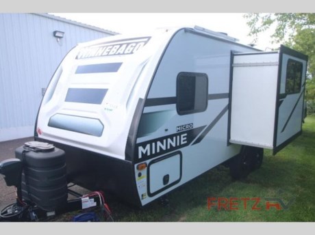&lt;h2&gt;&lt;strong&gt;New 2024 Winnebago Micro Minnie 2108TB Travel Trailer Camper for Sale at Fretz RV&lt;/strong&gt;&lt;/h2&gt; &lt;p&gt;&#160;&lt;/p&gt; &lt;p&gt;&lt;strong&gt;Winnebago Industries Towables Micro Minnie travel trailer 2108TB highlights:&lt;/strong&gt;&lt;/p&gt; &lt;ul&gt; &lt;li&gt;Two Twin Beds&lt;/li&gt; &lt;li&gt;Full Rear Bathroom&lt;/li&gt; &lt;li&gt;Patio Speakers&lt;/li&gt; &lt;li&gt;USB Charging Ports&lt;/li&gt; &lt;li&gt;10.3 Cu. Ft. Refrigerator&lt;/li&gt; &lt;/ul&gt; &lt;p&gt;&#160;&lt;/p&gt; &lt;p&gt;Come see just how accommodating this travel trailer can be! The two 32&quot; x 74&quot; twin beds up front have a nightstand in between them and a divider curtain to draw, plus they can convert into one &lt;strong&gt;74&quot; x 82&quot; king-size bed&lt;/strong&gt;. The 44&quot; x 72&quot; &lt;strong&gt;booth dinette slide&lt;/strong&gt; can also convert into an extra sleeping space when you&#39;re not using it for meal time or playing games. Everyone can get squeaky clean in the full rear bathroom, and the &lt;strong&gt;wardrobe&lt;/strong&gt; is a convenient place to store your linens and extra clothes. Grab a snack from the kitchen pantry or pop a bag of popcorn in the microwave then watch a movie on the &lt;strong&gt;LED TV&lt;/strong&gt; or head outdoors and relax underneath the power awning while your favorite tunes play through the patio speakers!&lt;/p&gt; &lt;p&gt;&#160;&lt;/p&gt; &lt;p&gt;Start out on your boundless journey in one of these Winnebago Industries Towables Micro Minnie travel trailers! Towing is made simple with the &lt;strong&gt;7&#39; width&lt;/strong&gt; to keep your Micro Minnie in your rear-view mirror. They don&#39;t lack in features either although they are &lt;strong&gt;compact&lt;/strong&gt; in size. The spacious galley including a sink, refrigerator, two burner cooktop, and even a microwave oven allows you to cook without compromise. You will not only enjoy the entertainment found indoors with an LED TV, a &lt;strong&gt;JBL premium sound system&lt;/strong&gt; and Aura Cube high performance mechless media center, but outdoors you will also enjoy the JBL premium speakers and a power awning with LED lighting. Each model also comes with &lt;strong&gt;flexible exterior storage&lt;/strong&gt; to make packing quick and easy. What are you waiting for, come choose your model today!&lt;/p&gt; &lt;p&gt;&#160;&lt;/p&gt; &lt;p&gt;We are a premier dealer for all 2022, 2023, 2024 and 2025&#160;Winnebago Minnie, Micro, M-Series, Access, Voyage, Hike, 100, FLX, Flex, Jayco Jay Flight, Eagle, HT, Jay Feather, Micro, White Hawk, Bungalow, North Point, Pinnacle, Talon, Octane, Seismic, SLX, OPUS, OP4, OP2, OP15, OPLite, Air Off Road, and TAXA Outdoors, Habitat, Overland, Cricket, Tiger Moth, Mantis, Ember RV Touring and Skinny Guy Truck Campers.&#160;So, if you are in the York, Harrisburg, Lancaster, Philadelphia, Allentown, New Jersey, Delaware New York, or Maryland regions; stop by and browse our huge RV inventory today.&#160;Fretz RV has been a Jayco Dealer Partner for over 40 years, Winnebago Dealer Partner for over 30 Years.&lt;/p&gt; &lt;p&gt;Many dealers posted online sale prices &lt;strong&gt;DO NOT &lt;/strong&gt;include Freight, Destination, Dealer Prep, Orientation/Demo, RV Wash Battery for Towables, Propane, and Fuel for Motorized; totaling &lt;strong&gt;THOUSANDS OF DOLLARS&lt;/strong&gt; that will be added after the sale.&lt;/p&gt; &lt;p&gt;All our Online Sale Prices &lt;strong&gt;&lt;u&gt;INCLUDE&lt;/u&gt;&lt;/strong&gt; these fees and accessories!&lt;/p&gt; &lt;p&gt;These campers come in as Travel Trailers, Fifth 5th Wheels, Toy Haulers, Pop Ups, Hybrids, Tear Drops, and Folding Campers. These Brands are at the top of their class. Camper floorplans come with anywhere between zero to 5 slides. Most can be pulled with a &#189; ton truck, SUV or Minivan. If you are not sure if you can tow certain weights, you can contact us or you can get tow ratings from Trailer Life towing guide.&lt;/p&gt; &lt;p&gt;We also carry used and Certified Pre-owned brands like Forest River, Salem, Mobile Suites, DRV, Sol Dawn Intech, T@B, T@G, Dutchmen, Keystone, KZ, Grand Design, Reflection, Imagine, Passport, Lance Freedom Lite, Freedom Express, Flagstaff, Rockwood, Casita, Scamp, Cedar Creek, Montana, Passport, Little Guy, Coachmen, Catalina, Cougar, Springdale, Sunset Trail, Raptor, Gulf Stream and Airstream, and are always below NADA values. We take all types of trades. When it comes to campers, we are your full-service stop. With over 77 years in business, we have built an excellent reputation in the Recreational Vehicle and Camping industry to our customers as well as our suppliers and manufacturers.&#160;With our participation in the Hershey RV Show every year we can display the newest product with great savings to customers! Besides our online presence, at Fretz RV we have a 12,000 Sq. Ft showroom, a huge RV&#160;Parts, and Accessories store. We have added a 30,000 square foot Indoor Service Facility that opened in the Spring of 2018. We have a full Service and Repair shop with RVIA Certified Technicians. &#160;Financing available. We have RV Insurance through Geico Brown and Brown and Progressive that we can provide instant quotes, RV Warranties through Compass and Protective XtraRide, and RV Rentals. We have detailed videos on RVTrader, RVT, Classified Ads, eBay, RVUSA and Youtube. Like us on Facebook. Check out our great Google and Dealer Rater reviews at Fretz RV. We are located at 3479 Bethlehem Pike,&#160;Souderton,&#160;PA&#160;18964&#160;215-723-3121&#160;&lt;/p&gt; &lt;p&gt;#RV #GoCamping #GoRVing #1 #Used #New #PaDealer #Camping&lt;/p&gt;&lt;ul&gt;&lt;li&gt;Front Bedroom&lt;/li&gt;&lt;li&gt;Rear Bath&lt;/li&gt;&lt;/ul&gt;&lt;ul&gt;&lt;li&gt;12V Holding Tank Pad Heaters w/ Interior SwitchPower Stab JacksGoodyear Wrangler Radial Tires8 Cu Ft. Gas/Electric RefrigeratorVersatility PackageAdventure PackageConvenience Package&lt;/li&gt;&lt;/ul&gt;