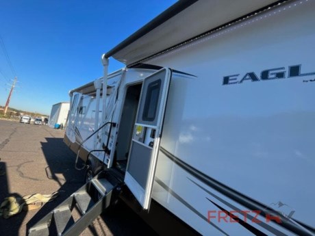 &lt;h2&gt;&lt;strong&gt;Used Pre-Owned 2021 Jayco Eagle 332 CBOK Travel Trailer Camper for Sale at Fretz RV&lt;/strong&gt;&lt;/h2&gt; &lt;p&gt;&#160;&lt;/p&gt; &lt;p&gt;&lt;strong&gt;Jayco Eagle travel trailer 332CBOK highlights:&lt;/strong&gt;&lt;/p&gt; &lt;ul&gt; &lt;li&gt;Fireplace&lt;/li&gt; &lt;li&gt;Center Bar w/ Stools&lt;/li&gt; &lt;li&gt;Whisper Quiet Air Conditioners&lt;/li&gt; &lt;li&gt;Spacious Wardrobe&lt;/li&gt; &lt;li&gt;Theater Seating&lt;/li&gt; &lt;li&gt;Pass-Through Storage&#160;&lt;/li&gt; &lt;/ul&gt; &lt;p&gt;&#160;&lt;/p&gt; &lt;p&gt;You will feel right at home in this fifth wheel with the &lt;strong&gt;front private bedroom&lt;/strong&gt; featuring a queen bed, a dresser, and a wardrobe that is prepped to add the optional washer and dryer! The full bathroom has a &lt;strong&gt;shower with a seat&lt;/strong&gt; for a relaxing, hot shower after playing in the sand all day. The hide-a-bed sofa doubles as a seating and sleeping space, and the theater seating will be everyone&#39;s choice to sit in as it is directly across from the &lt;strong&gt;entertainment center&lt;/strong&gt; with a fireplace and 50&quot; HDTV. The rustic center bar top comes with a bar stool on either side for two to socialize with you as you prepare dinner at the three burner cooktop or you can breathe in some fresh air while you cook at the &lt;strong&gt;outside kitchen&lt;/strong&gt; which also has a refrigerator to keep your beverage cold!&lt;/p&gt; &lt;p&gt;&#160;&lt;/p&gt; &lt;p&gt;Start having generations of family fun with any one of these Jayco Eagle travel trailers and fifth wheels! Jayco has taken the extra steps to build high quality products that have the most advanced construction techniques with the &lt;strong&gt;StrongholdVBL™ vacuum-bond lamination&lt;/strong&gt; that is the lightest yet strongest construction available in the RV industry. The Magnum Truss Roof System is 50% stronger than other roofs in the industry and are built to outlast everything but your memories with top-quality materials and innovative manufacturing techniques. There are &lt;strong&gt;three mandatory packages&lt;/strong&gt; in addition to the long list of standard features to make each and every trip as enjoyable as it can be. A few of these features include a patent-pending &lt;strong&gt;Drinking Water System™&lt;/strong&gt;, an LED fireplace with 5,000 BTU electric space heater, MORryde&#174; StepAbove™ entrance steps&#160; with blue LED light, and an observation camera prep on the rear and sides. With &lt;strong&gt;Goodyear&#174; Endurance&#174; tires&lt;/strong&gt; made in the U.S.A, Dexter&#174; axles with Nev-R-Adjust&#174; brakes and E-Z Lube&#174; hubs, and a MORryde&#174; CRE--3000™ rubberized suspension, you will experience a smooth ride. Don&#39;t wait any longer, come choose your favorite one today!&lt;/p&gt; &lt;p&gt;&#160;&lt;/p&gt; &lt;p&gt;We are a premier dealer for all 2022, 2023, 2024 and 2025&#160;Winnebago Minnie, Micro, M-Series, Access, Voyage, Hike, 100, FLX, Flex, Jayco Jay Flight, Eagle, HT, Jay Feather, Micro, White Hawk, Bungalow, North Point, Pinnacle, Talon, Octane, Seismic, SLX, OPUS, OP4, OP2, OP15, OPLite, Air Off Road, and TAXA Outdoors, Habitat, Overland, Cricket, Tiger Moth, Mantis, Ember RV Touring and Skinny Guy Truck Campers.&#160;So, if you are in the York, Harrisburg, Lancaster, Philadelphia, Allentown, New Jersey, Delaware New York, or Maryland regions; stop by and browse our huge RV inventory today.&#160;Fretz RV has been a Jayco Dealer Partner for over 40 years, Winnebago Dealer Partner for over 30 Years.&lt;/p&gt; &lt;p&gt;&#160;&lt;/p&gt; &lt;p&gt;These campers come in as Travel Trailers, Fifth 5th Wheels, Toy Haulers, Pop Ups, Hybrids, Tear Drops, and Folding Campers. These Brands are at the top of their class. Camper floorplans come with anywhere between zero to 5 slides. Most can be pulled with a &#189; ton truck, SUV or Minivan. If you are not sure if you can tow certain weights, you can contact us or you can get tow ratings from Trailer Life towing guide.&lt;/p&gt; &lt;p&gt;We also carry used and Certified Pre-owned brands like Forest River, Salem, Mobile Suites, DRV, Sol Dawn Intech, T@B, T@G, Dutchmen, Keystone, KZ, Grand Design, Reflection, Imagine, Passport, Lance Freedom Lite, Freedom Express, Flagstaff, Rockwood, Casita, Scamp, Cedar Creek, Montana, Passport, Little Guy, Coachmen, Catalina, Cougar, Springdale, Sunset Trail, Raptor, Gulf Stream and Airstream, and are always below NADA values. We take all types of trades. When it comes to campers, we are your full-service stop. With over 77 years in business, we have built an excellent reputation in the Recreational Vehicle and Camping industry to our customers as well as our suppliers and manufacturers.&#160;With our participation in the Hershey RV Show every year we can display the newest product with great savings to customers! Besides our online presence, at Fretz RV we have a 12,000 Sq. Ft showroom, a huge RV&#160;Parts, and Accessories store. We have added a 30,000 square foot Indoor Service Facility that opened in the Spring of 2018. We have a full Service and Repair shop with RVIA Certified Technicians. &#160;Financing available. We have RV Insurance through Geico Brown and Brown and Progressive that we can provide instant quotes, RV Warranties through Compass and Protective XtraRide, and RV Rentals. We have detailed videos on RVTrader, RVT, Classified Ads, eBay, RVUSA and Youtube. Like us on Facebook. Check out our great Google and Dealer Rater reviews at Fretz RV. We are located at 3479 Bethlehem Pike,&#160;Souderton,&#160;PA&#160;18964&#160;215-723-3121&#160;&lt;/p&gt; &lt;p&gt;#RV #GoCamping #GoRVing #1 #Used #New #PaDealer #Camping&lt;/p&gt;&lt;ul&gt;&lt;li&gt;Front Bedroom&lt;/li&gt;&lt;li&gt;Outdoor Kitchen&lt;/li&gt;&lt;li&gt;Rear Kitchen&lt;/li&gt;&lt;li&gt;Kitchen Island&lt;/li&gt;&lt;/ul&gt;&lt;ul&gt;&lt;li&gt;Non-Smoking UnitNo Pet OdorsAS ISReal CleanRefrigeratorTVPower AwningSlideoutFurnaceMicrowaveStoveA/CFantastic FanExterior TVToiletOvenGas/Electric Water HeaterExternal ShowerPower Hitch JackWasher/Dryer PrepShower&lt;/li&gt;&lt;/ul&gt;