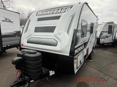 &lt;h2&gt;&lt;strong&gt;New 2024 Winnebago Micro Minnie 1700BH Travel Trailer Camper for Sale at Fretz RV&#160;&lt;/strong&gt;&lt;/h2&gt; &lt;p&gt;&#160;&lt;/p&gt; &lt;p&gt;&lt;strong&gt;Winnebago Industries Towables Micro Minnie travel trailer 1700BH highlights:&lt;/strong&gt;&lt;/p&gt; &lt;ul&gt; &lt;li&gt;Front Full-Size Bed&lt;/li&gt; &lt;li&gt;Divider Curtain&lt;/li&gt; &lt;li&gt;Booth Dinette&lt;/li&gt; &lt;li&gt;Bunk Beds&lt;/li&gt; &lt;li&gt;Rear Corner Bath&lt;/li&gt; &lt;/ul&gt; &lt;p&gt;&#160;&lt;/p&gt; &lt;p&gt;This travel trailer is ideal for a family or group of friends! With a set of &lt;strong&gt;bunk beds&lt;/strong&gt; in the rear corner and a front 54&quot; x 74&quot; bed, everyone will enjoy a good night&#39;s rest. There is even an &lt;strong&gt;exterior pack-n-play&lt;/strong&gt; &lt;strong&gt;door&lt;/strong&gt; allowing you to easily store items under the bunks so they are safe inside. The rear corner bathroom features a shower and toilet so that you don&#39;t have to use the public facilities. Once you are squeaky clean, you can grab a beverage from the refrigerator and play a card game at the 32&quot; x 74&quot; booth dinette. And the &lt;strong&gt;power awning with LED lights&lt;/strong&gt; will provide an outdoor living area protected from the elements so you can relax and unwind while enjoying the outdoors.&lt;/p&gt; &lt;p&gt;&#160;&lt;/p&gt; &lt;p&gt;Start out on your boundless journey in one of these Winnebago Industries Towables Micro Minnie travel trailers! Towing is made simple with the &lt;strong&gt;7&#39; width&lt;/strong&gt; to keep your Micro Minnie in your rear-view mirror. They don&#39;t lack in features either although they are compact in size. The &lt;strong&gt;spacious galley&lt;/strong&gt;&#160;including a sink, refrigerator, two burner cooktop, and even a convection microwave oven allows you to cook without compromise. You will not only enjoy the entertainment found indoors with an LED TV, a &lt;strong&gt;JBL premium sound system&lt;/strong&gt; and Aura Cube high performance mechless media center, but outdoors you will also enjoy the JBL premium speakers and a power awning with LED lighting. Each model also comes with &lt;strong&gt;flexible exterior storage&lt;/strong&gt; to make packing quick and easy, a 200-watt solar panel for off-grid camping, and&lt;strong&gt; Dexter TORFLEX torsion stub axles&lt;/strong&gt; for smooth towing!&lt;/p&gt; &lt;p&gt;&#160;&lt;/p&gt; &lt;p&gt;We are a premier dealer for all 2022, 2023, 2024 and 2025&#160;Winnebago Minnie, Micro, M-Series, Access, Voyage, Hike, 100, FLX, Flex, Jayco Jay Flight, Eagle, HT, Jay Feather, Micro, White Hawk, Bungalow, North Point, Pinnacle, Talon, Octane, Seismic, SLX, OPUS, OP4, OP2, OP15, OPLite, Air Off Road, and TAXA Outdoors, Habitat, Overland, Cricket, Tiger Moth, Mantis, Ember RV Touring and Skinny Guy Truck Campers.&#160;So, if you are in the York, Harrisburg, Lancaster, Philadelphia, Allentown, New Jersey, Delaware New York, or Maryland regions; stop by and browse our huge RV inventory today.&#160;Fretz RV has been a Jayco Dealer Partner for over 40 years, Winnebago Dealer Partner for over 30 Years.&lt;/p&gt; &lt;p&gt;&#160;&lt;/p&gt; &lt;p&gt;These campers come in as Travel Trailers, Fifth 5th Wheels, Toy Haulers, Pop Ups, Hybrids, Tear Drops, and Folding Campers. These Brands are at the top of their class. Camper floorplans come with anywhere between zero to 5 slides. Most can be pulled with a &#189; ton truck, SUV or Minivan. If you are not sure if you can tow certain weights, you can contact us or you can get tow ratings from Trailer Life towing guide.&lt;/p&gt; &lt;p&gt;We also carry used and Certified Pre-owned brands like Forest River, Salem, Mobile Suites, DRV, Sol Dawn Intech, T@B, T@G, Dutchmen, Keystone, KZ, Grand Design, Reflection, Imagine, Passport, Lance Freedom Lite, Freedom Express, Flagstaff, Rockwood, Casita, Scamp, Cedar Creek, Montana, Passport, Little Guy, Coachmen, Catalina, Cougar, Springdale, Sunset Trail, Raptor, Gulf Stream and Airstream, and are always below NADA values. We take all types of trades. When it comes to campers, we are your full-service stop. With over 77 years in business, we have built an excellent reputation in the Recreational Vehicle and Camping industry to our customers as well as our suppliers and manufacturers.&#160;With our participation in the Hershey RV Show every year we can display the newest product with great savings to customers! Besides our online presence, at Fretz RV we have a 12,000 Sq. Ft showroom, a huge RV&#160;Parts, and Accessories store. We have added a 30,000 square foot Indoor Service Facility that opened in the Spring of 2018. We have a full Service and Repair shop with RVIA Certified Technicians. &#160;Financing available. We have RV Insurance through Geico Brown and Brown and Progressive that we can provide instant quotes, RV Warranties through Compass and Protective XtraRide, and RV Rentals. We have detailed videos on RVTrader, RVT, Classified Ads, eBay, RVUSA and Youtube. Like us on Facebook. Check out our great Google and Dealer Rater reviews at Fretz RV. We are located at 3479 Bethlehem Pike,&#160;Souderton,&#160;PA&#160;18964&#160;215-723-3121&#160;&lt;/p&gt; &lt;p&gt;#RV #GoCamping #GoRVing #1 #Used #New #PaDealer #Camping&lt;/p&gt;&lt;ul&gt;&lt;li&gt;Bunkhouse&lt;/li&gt;&lt;/ul&gt;&lt;ul&gt;&lt;li&gt;200 Watt Solar Panel w/Charge Control Monitor12V Holding Tank Pad Heaters w/ Interior SwitchPower Stab JacksAdventure PackageConvenience Package&lt;/li&gt;&lt;/ul&gt;