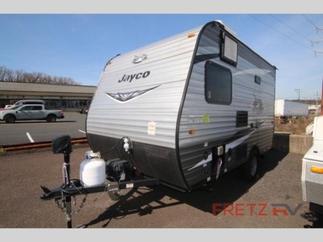 &lt;p&gt;&lt;strong&gt;Used Pre-Owned 2021 Jayco Jay Flight SLX 145RB Travel Trailer Camper for Sale at Fretz RV of Philadelphia&lt;/strong&gt;&lt;/p&gt; &lt;p&gt;&#160;&lt;/p&gt; &lt;p&gt;&lt;strong&gt;Jayco Jay Flight SLX 7 travel trailer 145RB highlights:&lt;/strong&gt;&lt;/p&gt; &lt;ul&gt; &lt;li&gt;Front Dinette&lt;/li&gt; &lt;li&gt;Bathroom Skylight&lt;/li&gt; &lt;li&gt;Large Front Window&lt;/li&gt; &lt;li&gt;Abundant Seating Space&lt;/li&gt; &lt;li&gt;Microwave Oven&lt;/li&gt; &lt;li&gt;Rear Hardwood Cabinet Doors&lt;/li&gt; &lt;/ul&gt; &lt;p&gt;&#160;&lt;/p&gt; &lt;p&gt;This is the perfect couple&#39;s trailer for your trip to the lake. Once you arrive at your destination, prepare a quick meal on the&lt;strong&gt; two burner cooktop&lt;/strong&gt;. After you&#39;ve hiked a trail or two, get cleaned up in the private&lt;strong&gt; tub/shower&lt;/strong&gt; room that also includes the toilet for convenience. Stretch out on the &lt;strong&gt;sofa&lt;/strong&gt; or play a game of cards at the booth dinette, and when you&#39;re ready for bed you can convert this area to comfortable sleeping space. This model also includes a wardrobe to hang your clothes, plus &lt;strong&gt;overhead compartments&lt;/strong&gt; to store your special belongings.&lt;/p&gt; &lt;p&gt;&#160;&lt;/p&gt; &lt;p&gt;You can&#39;t go wrong with a Jay Flight SLX 7 travel trailer by Jayco. These lightweight 7&#39; wide models feature a &lt;strong&gt;fully-integrated A-frame&lt;/strong&gt;, stabilizer jacks with two pads, plus a &lt;strong&gt;Magnum Truss roof system&lt;/strong&gt; with seamless DiFlexx II material for a strong, sturdy unit made to last. Each model includes &lt;strong&gt;brushed nickel faucets&lt;/strong&gt;, pleated window shades, a bath skylight, plus a premium multimedia sound system with MP3/iPod input jacks and Bluetooth connectivity for your entertainment needs. These travel trailers also include &lt;strong&gt;Goodyear Endurance tires&lt;/strong&gt;, made in the USA, a front diamond plate, and a power awning with LED lights that will create an outdoor living space you are sure to love!&lt;/p&gt; &lt;p&gt;&#160;&lt;/p&gt; &lt;p&gt;Fretz RV of Philadelphia is the nations premier dealer for all 2022, 2023, 2024 and 2025&#160;Winnebago Minnie, Micro, M-Series, Access, Voyage, Hike, 100, FLX, Flex, Jayco Jay Flight, Eagle, HT, Jay Feather, Micro, White Hawk, Bungalow, North Point, Pinnacle, Talon, Octane, Seismic, SLX, OPUS, OP4, OP2, OP15, OPLite, Air Off Road, and TAXA Outdoors, Habitat, Overland, Cricket, Tiger Moth, Mantis, Ember RV Touring and Skinny Guy Truck Campers.&#160;So, if you are in the York, Harrisburg, Lancaster, Philadelphia, Allentown, New Jersey, Delaware New York, or Maryland regions; stop by and browse our huge RV inventory today.&#160;Fretz RV has been a Jayco Dealer Partner for over 40 years, Winnebago Dealer Partner for over 30 Years.&lt;/p&gt; &lt;p&gt;We also carry used and Certified Pre-owned brands like Forest River, Salem, Wildwood,&#160; TAB, TAG, NuCamp, Cherokee, Coleman, R-Pod, A-Liner, Dutchmen, Keystone, KZ, Grand Design, Reflection, Imagine, Passport, Lance, Solitude, Freedom Lite, Express, Flagstaff, Rockwood, Montana, Passport, Little Guy, Coachmen, Catalina, Cougar,&#160; Sunset Trail, Raptor, Vengeance, Gulf Stream and Airstream, and are always below NADA values. We take all types of trades. When it comes to campers, we are your full-service stop. With over 77 years in business, we have built an excellent reputation in the Recreational Vehicle and Camping industry to our customers as well as our suppliers and manufacturers.&#160;With our participation in the Hershey RV Show every year we can display the newest product with great savings to customers! Besides our online presence, at Fretz RV we have a 12,000 Sq. Ft showroom, a huge RV&#160;Parts, and Accessories store. We have added a 30,000 square foot Indoor Service Facility that opened in the Spring of 2018. We have a full Service and Repair shop with RVIA Certified Technicians. &#160;Financing available. We have RV Insurance through Geico Brown and Brown and Progressive that we can provide instant quotes, RV Warranties through Compass and Protective XtraRide, and RV Rentals. We have detailed videos on RVTrader, RVT, Classified Ads, eBay, RVUSA and Youtube. Like us on Facebook. Check out our great Google and Dealer Rater reviews at Fretz RV. Fretz RV of Philadelphia is located at 3479 Bethlehem Pike,&#160;Souderton,&#160;PA&#160;18964&#160;215-723-3121&#160;&lt;/p&gt; &lt;p&gt;Call for details.&#160;#RV #GoCamping #GoRVing #1 #Used #New #PaDealer #Camping&lt;/p&gt;&lt;ul&gt;&lt;li&gt;&lt;/li&gt;&lt;/ul&gt;