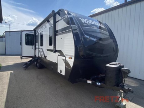 &lt;h2&gt;&lt;strong&gt;New 2024 Winnebago Voyage 3235FK Travel Trailer Camper for Sale at Fretz RV of Philadelphia&lt;/strong&gt;&lt;/h2&gt; &lt;p&gt;&#160;&lt;/p&gt; &lt;p&gt;&#160;&lt;/p&gt; &lt;p&gt;&lt;strong&gt;Winnebago Industries Towables Voyage travel trailer V3235FK highlights:&lt;/strong&gt;&lt;/p&gt; &lt;ul&gt; &lt;li&gt;Walk-Through Bath&lt;/li&gt; &lt;li&gt;Queen Bed Slide Out&lt;/li&gt; &lt;li&gt;Front Kitchen&lt;/li&gt; &lt;li&gt;Booth Dinette&lt;/li&gt; &lt;li&gt;Electric Awning with LED Lights&lt;/li&gt; &lt;/ul&gt; &lt;p&gt;&#160;&lt;/p&gt; &lt;p&gt;Step inside this &lt;strong&gt;dual entry &lt;/strong&gt;travel trailer for a world of comfort! The rear master bedroom includes its own exterior entry door, a queen bed slide out with an &lt;strong&gt;optional king bed&lt;/strong&gt;, dual nightstands, and even a bedroom fireplace! You will find a spacious walk-through bath that leads to the living area with a &lt;strong&gt;tri-fold sofa slide&lt;/strong&gt; out that also houses two end tables and the 15 cu. ft. 12V refrigerator. The chef of your group will love the front kitchen with ample counter space, a recessed three burner cooktop, plus a 30&quot;&lt;strong&gt; over-the-range convection microwave&lt;/strong&gt;. A booth dinette provides a place to dine together, or you can take your plate outdoors to sit under the electric awning with LED lights!&lt;/p&gt; &lt;p&gt;&#160;&lt;/p&gt; &lt;p&gt;Each Voyage travel trailer by Winnebago Industries Towables includes a &lt;strong&gt;200-watt solar panel&lt;/strong&gt; with a 30 amp-charge controller and resettable breaker so you can camp off-grid. Also included is a &lt;strong&gt;heated and enclosed underbelly&lt;/strong&gt; with radiant foil insulation for four seasons of travel, 2&quot; thick FILON&#174; MAX fiberglass sidewalls and a painted gel coat front cap with integrated LED lighting, a &lt;strong&gt;walk-on roof&lt;/strong&gt;, plus power stabilizers for easy setup and stability. The interior offers many comforts of home, &lt;strong&gt;large windows&lt;/strong&gt;, LED ceiling lights, ductless flooring throughout, and full kitchen amenities. No voyage is better than the one taken in a Voyage travel trailer! Come choose your model today!&lt;/p&gt; &lt;p&gt;&#160;&lt;/p&gt; &lt;p&gt;Fretz RV of Philadelphia is the nations premier dealer for all 2022, 2023, 2024 and 2025&#160;Winnebago Minnie, Micro, M-Series, Access, Voyage, Hike, 100, FLX, Flex, Jayco Jay Flight, Eagle, HT, Jay Feather, Micro, White Hawk, Bungalow, North Point, Pinnacle, Talon, Octane, Seismic, SLX, OPUS, OP4, OP2, OP15, OPLite, Air Off Road, and TAXA Outdoors, Habitat, Overland, Cricket, Tiger Moth, Mantis, Ember RV Touring and Skinny Guy Truck Campers.&#160;So, if you are in the York, Harrisburg, Lancaster, Philadelphia, Allentown, New Jersey, Delaware New York, or Maryland regions; stop by and browse our huge RV inventory today.&#160;Fretz RV has been a Jayco Dealer Partner for over 40 years, Winnebago Dealer Partner for over 30 Years.&lt;/p&gt; &lt;p&gt;We also carry used and Certified Pre-owned brands like Forest River, Salem, Wildwood,&#160; TAB, TAG, NuCamp, Cherokee, Coleman, R-Pod, A-Liner, Dutchmen, Keystone, KZ, Grand Design, Reflection, Imagine, Passport, Lance, Solitude, Freedom Lite, Express, Flagstaff, Rockwood, Montana, Passport, Little Guy, Coachmen, Catalina, Cougar,&#160; Sunset Trail, Raptor, Vengeance, Gulf Stream and Airstream, and are always below NADA values. We take all types of trades. When it comes to campers, we are your full-service stop. With over 77 years in business, we have built an excellent reputation in the Recreational Vehicle and Camping industry to our customers as well as our suppliers and manufacturers.&#160;With our participation in the Hershey RV Show every year we can display the newest product with great savings to customers! Besides our online presence, at Fretz RV we have a 12,000 Sq. Ft showroom, a huge RV&#160;Parts, and Accessories store. We have added a 30,000 square foot Indoor Service Facility that opened in the Spring of 2018. We have a full Service and Repair shop with RVIA Certified Technicians. &#160;Financing available. We have RV Insurance through Geico Brown and Brown and Progressive that we can provide instant quotes, RV Warranties through Compass and Protective XtraRide, and RV Rentals. We have detailed videos on RVTrader, RVT, Classified Ads, eBay, RVUSA and Youtube. Like us on Facebook. Check out our great Google and Dealer Rater reviews at Fretz RV. Fretz RV of Philadelphia is located at 3479 Bethlehem Pike,&#160;Souderton,&#160;PA&#160;18964&#160;215-723-3121&#160;&lt;/p&gt; &lt;p&gt;Call for details.&#160;#RV #GoCamping #GoRVing #1 #Used #New #PaDealer #Camping&lt;/p&gt;&lt;ul&gt;&lt;li&gt;Two Entry/Exit Doors&lt;/li&gt;&lt;li&gt;Front Kitchen&lt;/li&gt;&lt;li&gt;Walk-Thru Bath&lt;/li&gt;&lt;li&gt;Rear Bedroom&lt;/li&gt;&lt;/ul&gt;