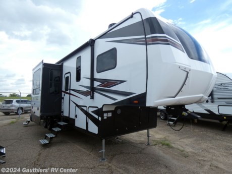 &lt;p&gt;&lt;span style=&quot;font-size: 14pt;&quot;&gt;&lt;strong&gt;TRIPLE SLIDE TOY HAULER FIFTH WHEEL W/ 5500 YAMAHA GENERATOR, TWO AWNINGS, AUTO LEVELING, FIREPLACE, AND RESIDENTIAL REFRIGERATOR.&lt;/strong&gt;&lt;/span&gt;&lt;/p&gt;