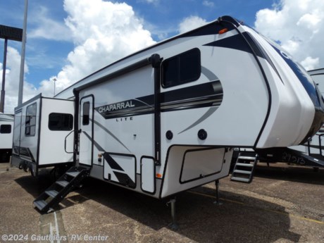 &lt;p&gt;&lt;span style=&quot;font-size: 14pt;&quot;&gt;&lt;strong&gt;DOUBLE SLIDE REAR LIVING FIFTH WHEEL W/ OUTSIDE KITCHEN, TWO A/C UNITS, FIREPLACE, THEATER SEATING, AND 12 VOLT 10 CU FT REFRIGERATOR.&lt;/strong&gt;&lt;/span&gt;&lt;/p&gt;