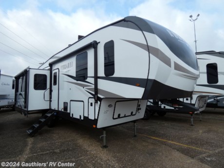 &lt;p&gt;&lt;span style=&quot;font-size: 16px;&quot;&gt;&lt;strong&gt;TRIPLE SLIDE REAR LIVING FIFTH WHEEL W/ AUTO LEVELING, TWO AWNINGS, TWO A/C UNITS, RESIDENTIAL REFRIGERATOR, WASHER - DRYER PREP, FIREPLACE, AND TIRE PRESSURE MONITORING SYSTEM.&lt;/strong&gt;&lt;/span&gt;&lt;/p&gt;