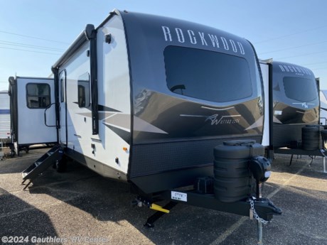 &lt;p&gt;&lt;span style=&quot;font-size: 14pt;&quot;&gt;&lt;strong&gt;TRIPLE SLIDE REAR LIVING TRAVEL TRAILER W/ ELECTRIC STABILIZER JACKS, TWO AWNINGS, TWO A/C UNITS, FIREPLACE, ROOFTOP SOLAR PANEL, 12 VOLT 10 CU FT REFRIGERATOR, AND KING SIZE BED.&lt;/strong&gt;&lt;/span&gt;&lt;/p&gt;