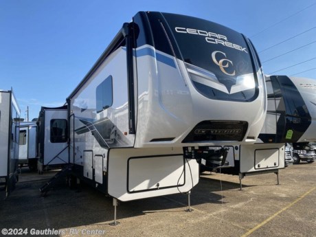 &lt;p&gt;&lt;span style=&quot;font-size: 14pt;&quot;&gt;&lt;strong&gt;TRIPLE SLIDE REAR KITCHEN FIFTH WHEEL W/ 6 POINT HYDRAULIC AUTO LEVELING, THREE A/C UNITS, THEATER SEATING, RESIDENTIAL REFRIGERATOR, KING SIZE BED, AND WASHER-DRYER PREP.&lt;/strong&gt;&lt;/span&gt;&lt;/p&gt;