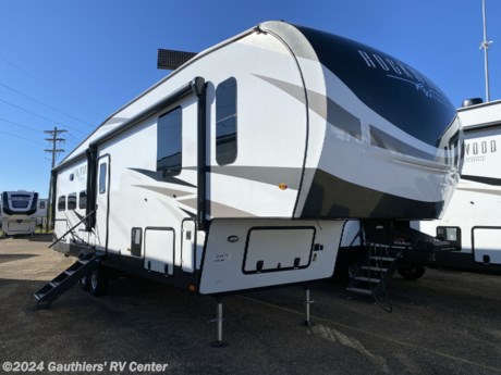 &lt;p&gt;&lt;strong&gt;&lt;span style=&quot;font-size: 14pt;&quot;&gt;DOUBLE SLIDE REAR KITCHEN FIFTH WHEEL W/ AUTO LEVELING, TWO A/C UNITS, ROOFTOP SOLAR PANEL, THEATER SEATING, WASHER-DRYER PREP, KING BED, AND 12 VOLT 18 CU FT REFRIGERATOR.&lt;/span&gt;&lt;/strong&gt;&lt;/p&gt;