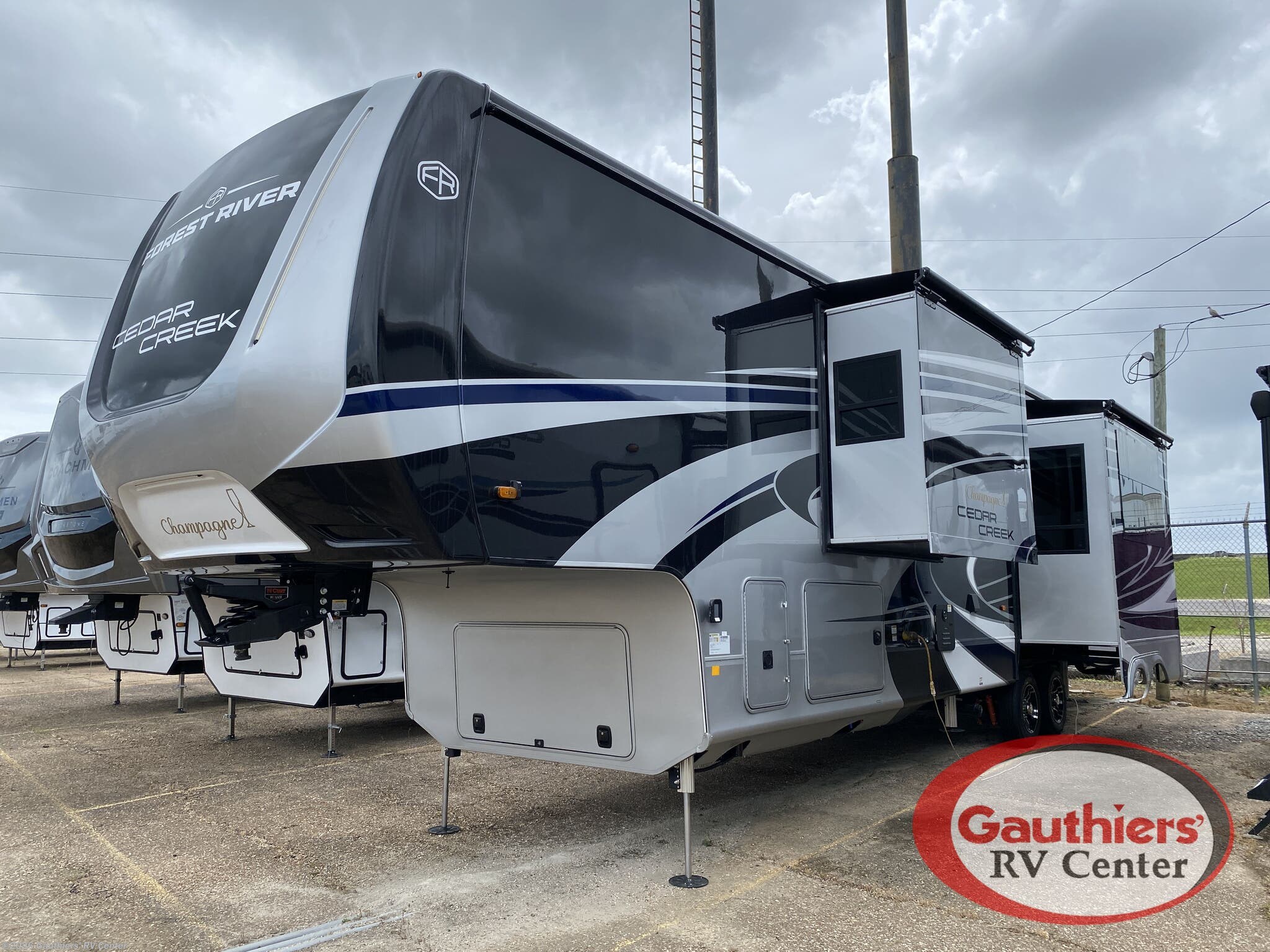 2026 Forest River Cedar Creek 385RK - New Fifth Wheel For Sale by Gauthiers' RV Center in Scott, Louisiana features Generator, Water Heater, Dryer, Bluetooth Stereo, Hide-A-Bed