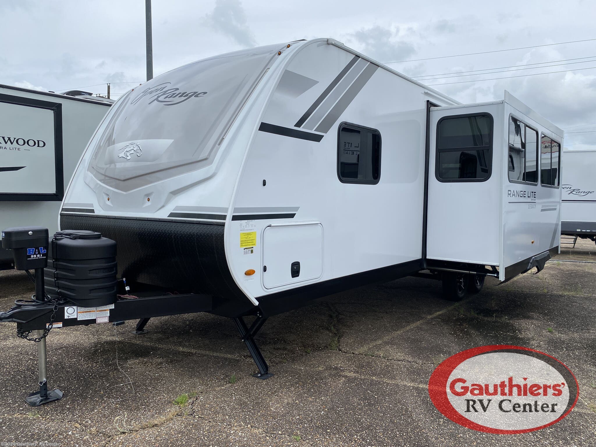 2026 Highland Ridge Open Range Range Lite 250RBL - New Travel Trailer For Sale by Gauthiers' RV Center in Scott, Louisiana features Refrigerator, Queen Bed, TV, Kitchen Sink, Power Awning