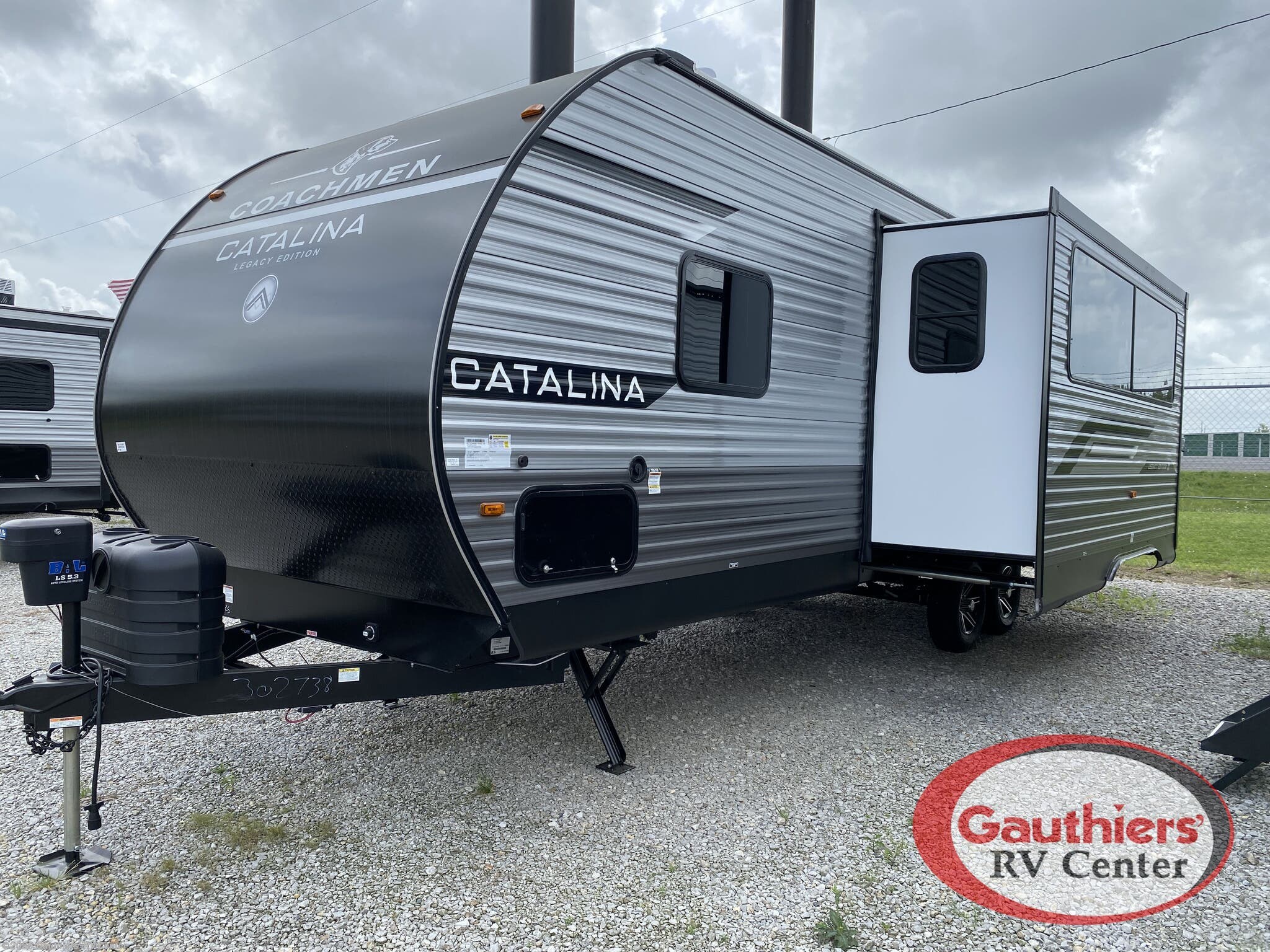 2026 Coachmen Catalina Legacy Edition 273DBHCK - New Travel Trailer For Sale by Gauthiers' RV Center in Scott, Louisiana features Slideout, Exterior Speakers, Microwave, Black Tank Flush, Thermofoil Countertops