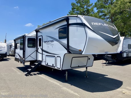 &lt;p&gt;&lt;strong&gt;2024 Grand Design Reflection Luxury 303RLS Fifth Wheel&lt;/strong&gt;&lt;/p&gt;
&lt;p&gt;&lt;em&gt;Rear Living, Front Queen Bed, Theater Seating...&lt;/em&gt;&lt;/p&gt;
&lt;p&gt;&lt;strong&gt;This trailer is equipped with:&lt;/strong&gt;&lt;/p&gt;
&lt;ul&gt;
&lt;li&gt;Peace of Mind Package&lt;/li&gt;
&lt;li&gt;Ultimate Power Package&lt;/li&gt;
&lt;li&gt;Arctic 4-Seasons Protection Package&lt;/li&gt;
&lt;li&gt;Solar Package w/&amp;nbsp;370W Solar Panel Upgrade&lt;/li&gt;
&lt;li&gt;Goodyear Tires&lt;/li&gt;
&lt;li&gt;Curt Axles&amp;nbsp;W/ABS&lt;/li&gt;
&lt;li&gt;Power Patio Awnings - 13&#39; &amp;amp; 10&#39; 6&quot;&lt;/li&gt;
&lt;li&gt;16 cf 12V Refrigerator/Freezer&lt;/li&gt;
&lt;li&gt;15,000 btu&amp;nbsp;Ducted Air Conditioner&lt;/li&gt;
&lt;li&gt;13,500 btu&amp;nbsp;Ducted Air Conditioner&lt;/li&gt;
&lt;li&gt;TraviFi On-Board WiFi Ready&lt;/li&gt;
&lt;li&gt;SafeRide RV Roadside Assistance&lt;/li&gt;
&lt;li&gt;Swivel Dinette w/2 Chairs &amp;amp; Storage Ottoman&lt;/li&gt;
&lt;/ul&gt;
&lt;p&gt;&lt;em&gt;&lt;strong&gt;Our Sale Price Includes:&amp;nbsp; Pre-Delivery Inspection, RV/Marine Battery, Propane Bottles Filled, Walk&amp;nbsp;Thru&amp;nbsp;Orientation &amp;amp; Factory Freight Charges...&lt;/strong&gt;&lt;/em&gt;&lt;/p&gt;