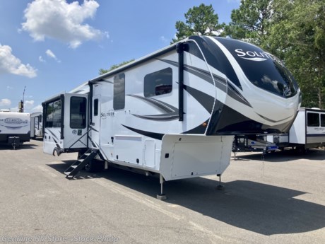 &lt;p&gt;&lt;span style=&quot;font-size: 16px;&quot;&gt;&lt;strong&gt;2024 Grand Design Solitude 370DV 5th Wheel Trailer...&lt;/strong&gt;&lt;/span&gt;&lt;/p&gt;
&lt;p&gt;&lt;em&gt;Rear Living, Front King Bed, Solar+ Package...&lt;/em&gt;&lt;/p&gt;
&lt;p&gt;&lt;em&gt;&lt;strong&gt;Features Include...&lt;/strong&gt;&lt;/em&gt;&lt;/p&gt;
&lt;ul&gt;
&lt;li&gt;Residential Living Package&lt;/li&gt;
&lt;li&gt;&quot;Peace of Mind&quot; Package&lt;/li&gt;
&lt;li&gt;&quot;Weather-Tek&quot; Package&lt;/li&gt;
&lt;li&gt;&quot;Max-Built&quot; Construction Package&lt;/li&gt;
&lt;li&gt;One Touch Six (6) Point Automatic Leveling System&lt;/li&gt;
&lt;li&gt;Central Vacuum System&lt;/li&gt;
&lt;li&gt;20 cf 12v/DC Refrigerator / Freezer&lt;/li&gt;
&lt;li&gt;TraviFi On-Board WiFi Ready&lt;/li&gt;
&lt;li&gt;50&quot; LED Television - Living Room&lt;/li&gt;
&lt;li&gt;32&quot; LED Television - Bedroom&lt;/li&gt;
&lt;li&gt;Electric Fireplace&lt;/li&gt;
&lt;li&gt;12v Tank Heaters&lt;/li&gt;
&lt;li&gt;Upgraded Cooper 17.5&quot; &quot;H&quot; Rated Tires w/ Aluminum Wheels&lt;/li&gt;
&lt;li&gt;SafeRide&amp;nbsp;RV Roadside Assistance&lt;/li&gt;
&lt;li&gt;Power Patio Awnings - 19&#39; &amp;amp; 11&#39;&lt;/li&gt;
&lt;li&gt;King Bed&lt;/li&gt;
&lt;li&gt;Three (3) 15,000 btu&amp;nbsp;Ducted Air Conditioners&lt;/li&gt;
&lt;li&gt;AC w/ Heat Pump&lt;/li&gt;
&lt;li&gt;Solar+ Package - Two (2) 330w Panels, 2,000w Inverter, 50 amp Controller&lt;/li&gt;
&lt;li&gt;8,000 lb Axles w/ ABS Drum Brakes&lt;/li&gt;
&lt;/ul&gt;
&lt;p&gt;&lt;span style=&quot;font-style: italic; font-weight: bold;&quot;&gt;Our Sale Price Includes: &amp;nbsp;Pre-Delivery Inspection, RV/Marine Batteries, Propane Bottles Filled, Walk&amp;nbsp;Thru&amp;nbsp;Orientation &amp;amp; Factory Freight Charges.&lt;/span&gt;&lt;/p&gt;
&lt;p&gt;&lt;span style=&quot;font-style: italic; font-weight: bold;&quot;&gt;&amp;nbsp;&lt;/span&gt;&lt;/p&gt;