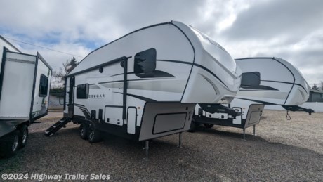 &lt;p&gt;&lt;strong&gt;ALL NEW!!! Cougar Sport 2100RK&lt;/strong&gt;&lt;/p&gt;
&lt;p&gt;&lt;strong&gt;25th Anniversary Package, Rear Electric&amp;nbsp;Jacks, Solar Flex 200 and RV 12cf Fridge.&amp;nbsp;&amp;nbsp;&lt;/strong&gt;&lt;/p&gt;
&lt;h3 class=&quot;copy-title&quot; style=&quot;box-sizing: border-box; padding: 0px; margin: 0px 0px 1.5rem; font-variant-numeric: inherit; font-variant-east-asian: inherit; font-variant-alternates: inherit; font-weight: inherit; font-stretch: inherit; font-size: 1.5rem; line-height: 1.25; font-family: Marcher-Medium, sans-serif; font-optical-sizing: inherit; font-kerning: inherit; font-feature-settings: inherit; font-variation-settings: inherit; -webkit-font-smoothing: antialiased; text-rendering: optimizelegibility; text-transform: uppercase; color: #3d383c;&quot; data-v-0fdbbb34=&quot;&quot;&gt;&lt;strong&gt;COUGAR SPORT: FOR ADVENTURE &amp;amp; BEYOND&lt;/strong&gt;&lt;/h3&gt;
&lt;div class=&quot;block-copy&quot; style=&quot;box-sizing: border-box; padding: 0px; margin: 1.5rem 0px 6rem; font-variant-numeric: inherit; font-variant-east-asian: inherit; font-variant-alternates: inherit; font-stretch: inherit; font-size: 1.25rem; line-height: 2rem; font-family: Marcher-Light, sans-serif; font-optical-sizing: inherit; font-kerning: inherit; font-feature-settings: inherit; font-variation-settings: inherit; -webkit-font-smoothing: antialiased; text-rendering: optimizelegibility; color: #3d383c;&quot; data-v-0fdbbb34=&quot;&quot;&gt;
&lt;p style=&quot;box-sizing: border-box; padding: 0px; margin: 0px; font-style: inherit; font-variant: inherit; font-weight: inherit; font-stretch: inherit; font-size: 1.125rem; line-height: 1.5; font-optical-sizing: inherit; font-kerning: inherit; font-feature-settings: inherit; font-variation-settings: inherit; -webkit-font-smoothing: antialiased; text-rendering: optimizelegibility; color: #5c5759;&quot;&gt;&lt;strong&gt;This limited edition of Cougar Sport is perfect for any active RVer who values Cougar&#39;s reputation and longevity. Safe and easy to tow, Cougar Sport serves up more than one might expect by preserving what customers love about the Cougar brand in a smaller, lighter package..&lt;/strong&gt;&lt;/p&gt;
&lt;/div&gt;
