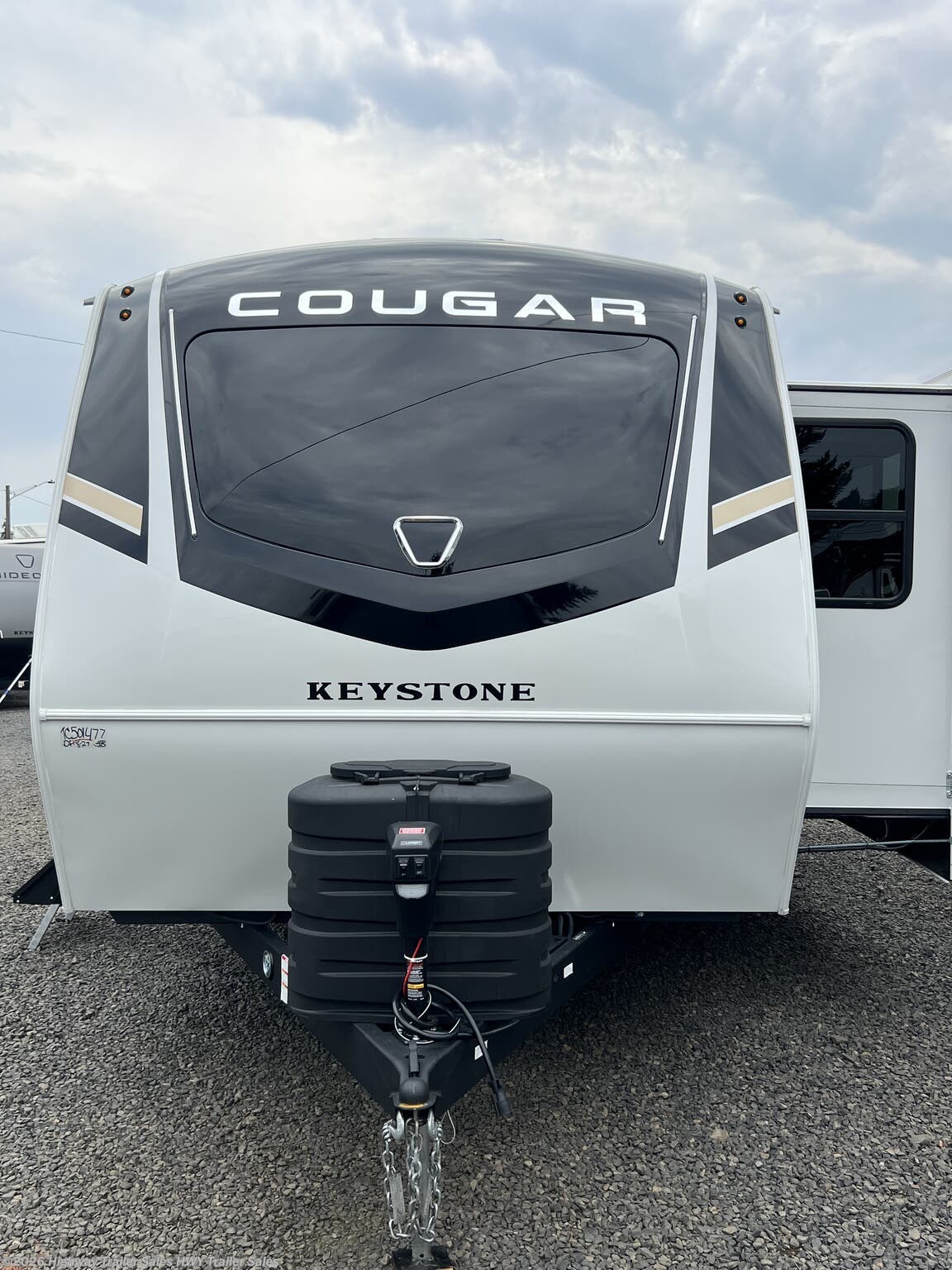 2026 Keystone Cougar Western 25FKWE - New Travel Trailer For Sale by Highway Trailer Sales in Salem, Oregon features Power Hitch Jack, Solar Panels, Toilet, Power Awning, 50 Amp Service