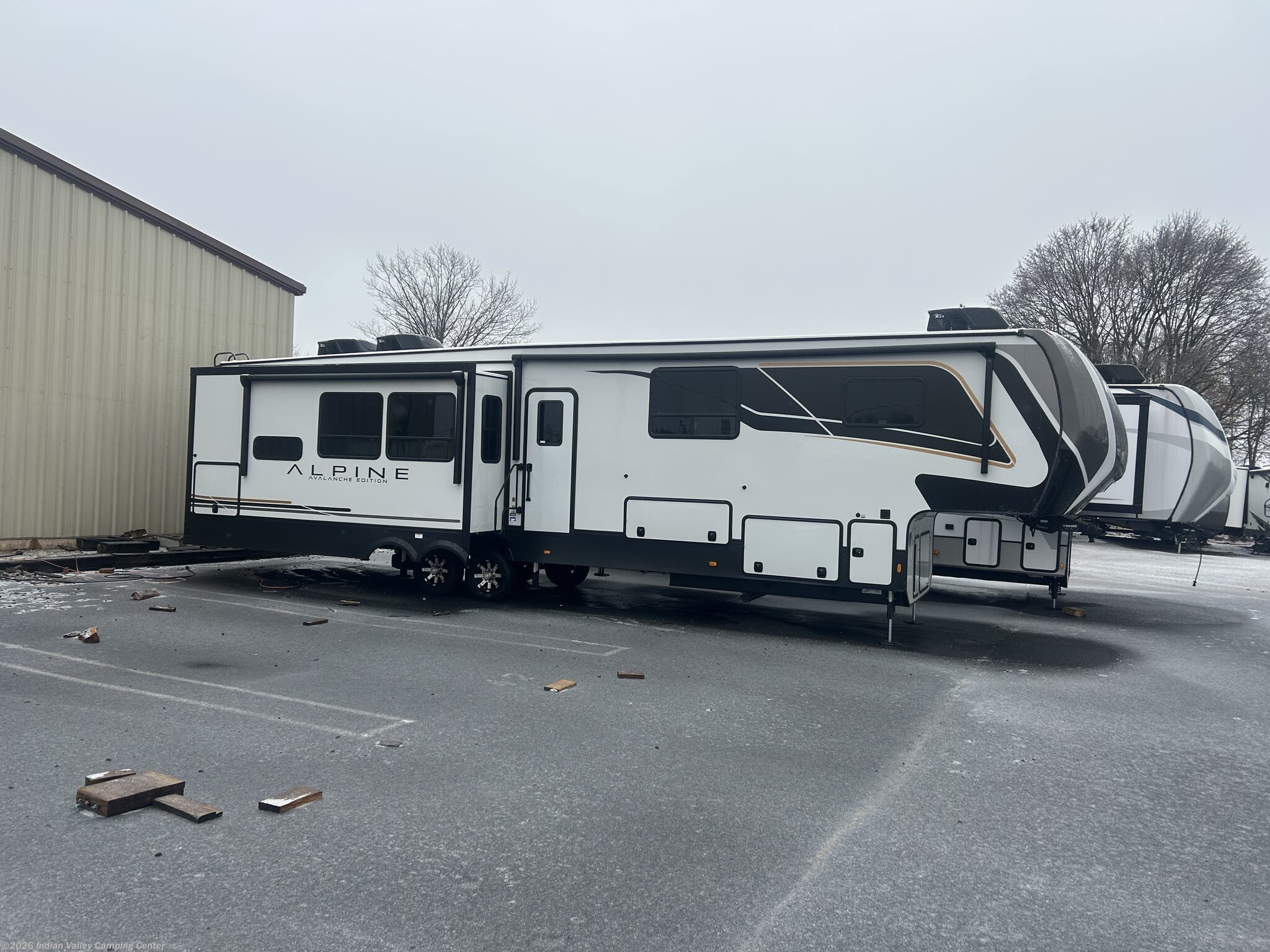 2026 Keystone Alpine Avalanche Edition 379MB - New Fifth Wheel For Sale by Indian Valley Camping Center in Souderton, Pennsylvania features Exterior Speakers, U-Shaped Dinette, Toilet, External Shower, CO Detector