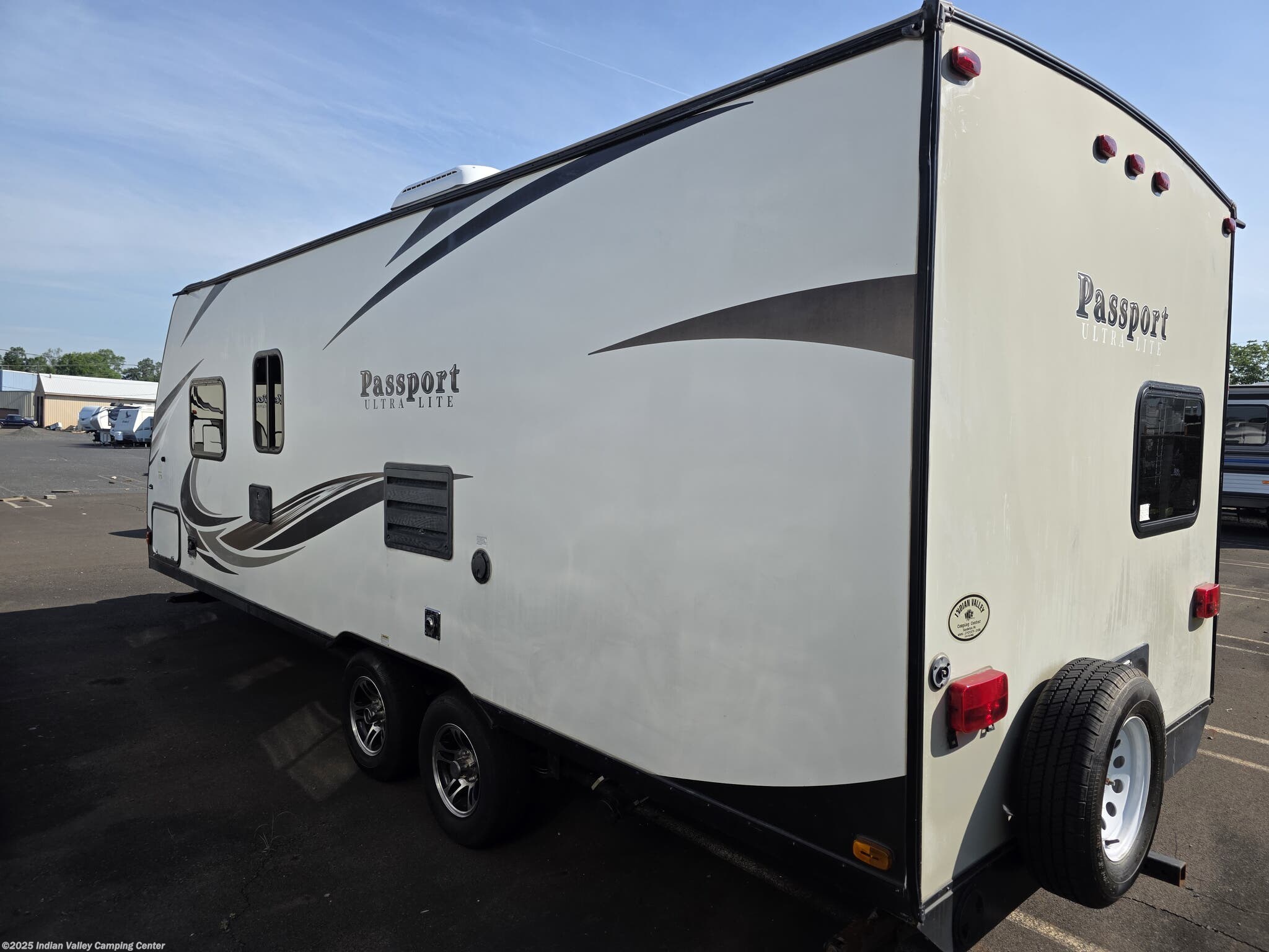 2018 Keystone Passport Ultra Lite Express 239ML - Used Travel Trailer For Sale by Indian Valley Camping Center in Souderton, Pennsylvania features Roof Vents, Outside Kitchen, CO Detector, Exterior Speakers, Booth Dinette