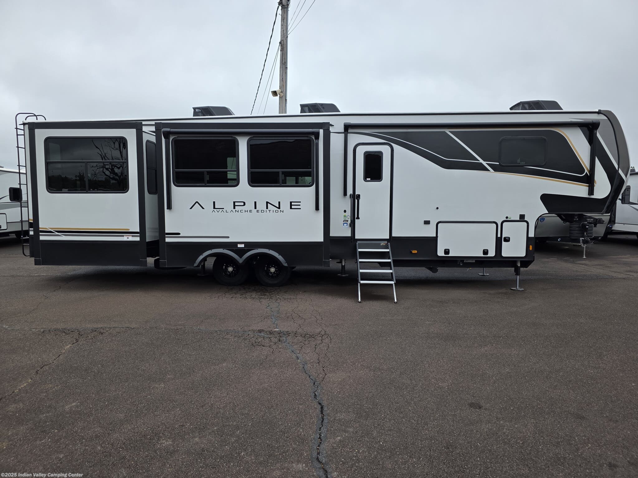 2025 Keystone Alpine Avalanche Edition 366LS - New Fifth Wheel For Sale by Indian Valley Camping Center in Souderton, Pennsylvania features Solar Panels, Rocker Recliner(s), Surround Sound System, Refrigerator, Air Conditioning