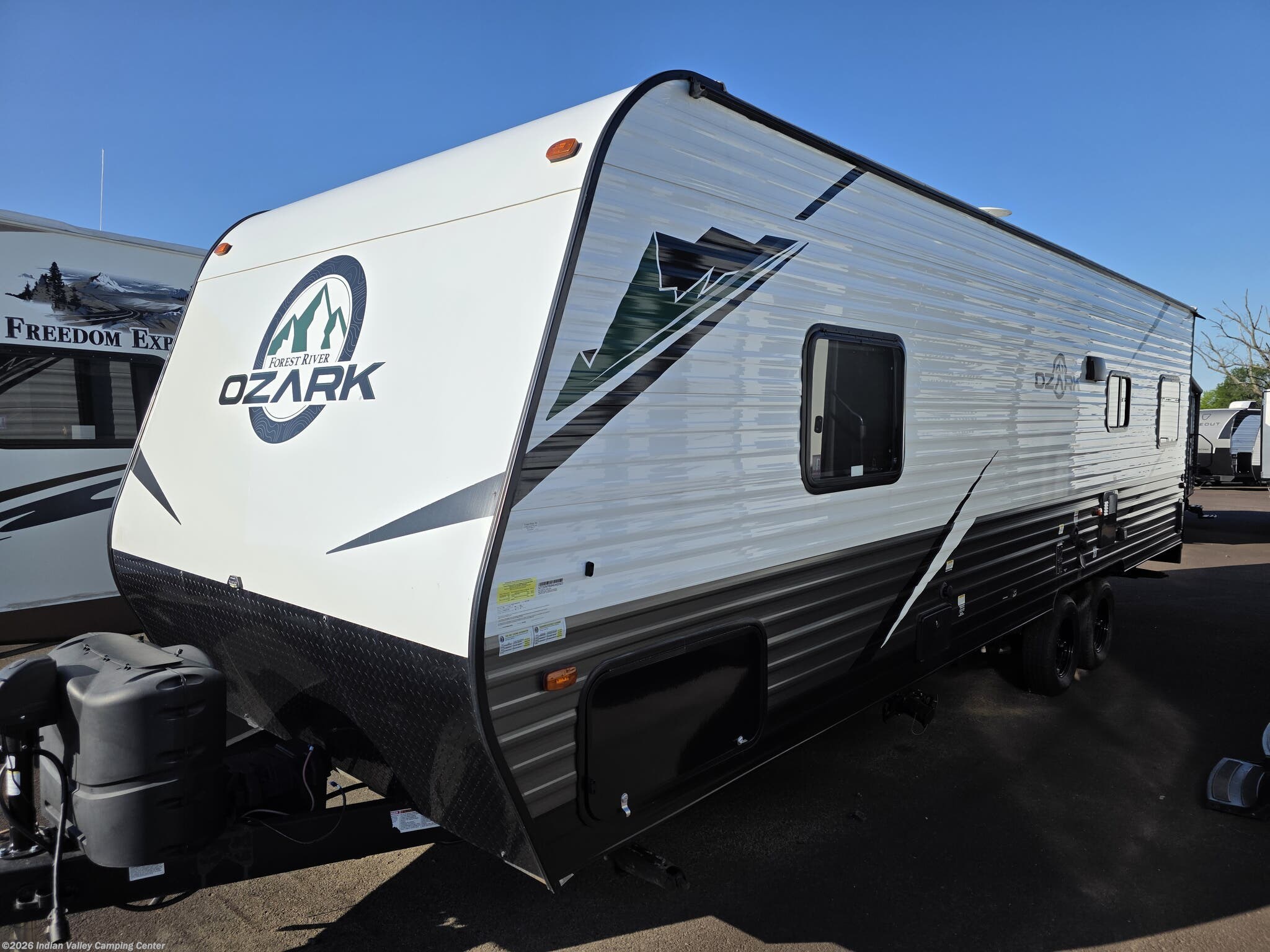 2022 Forest River Ozark 2500TH - Used Toy Hauler For Sale by Indian Valley Camping Center in Souderton, Pennsylvania features External Shower, Batteries, Converter, TV, Leveling Jacks